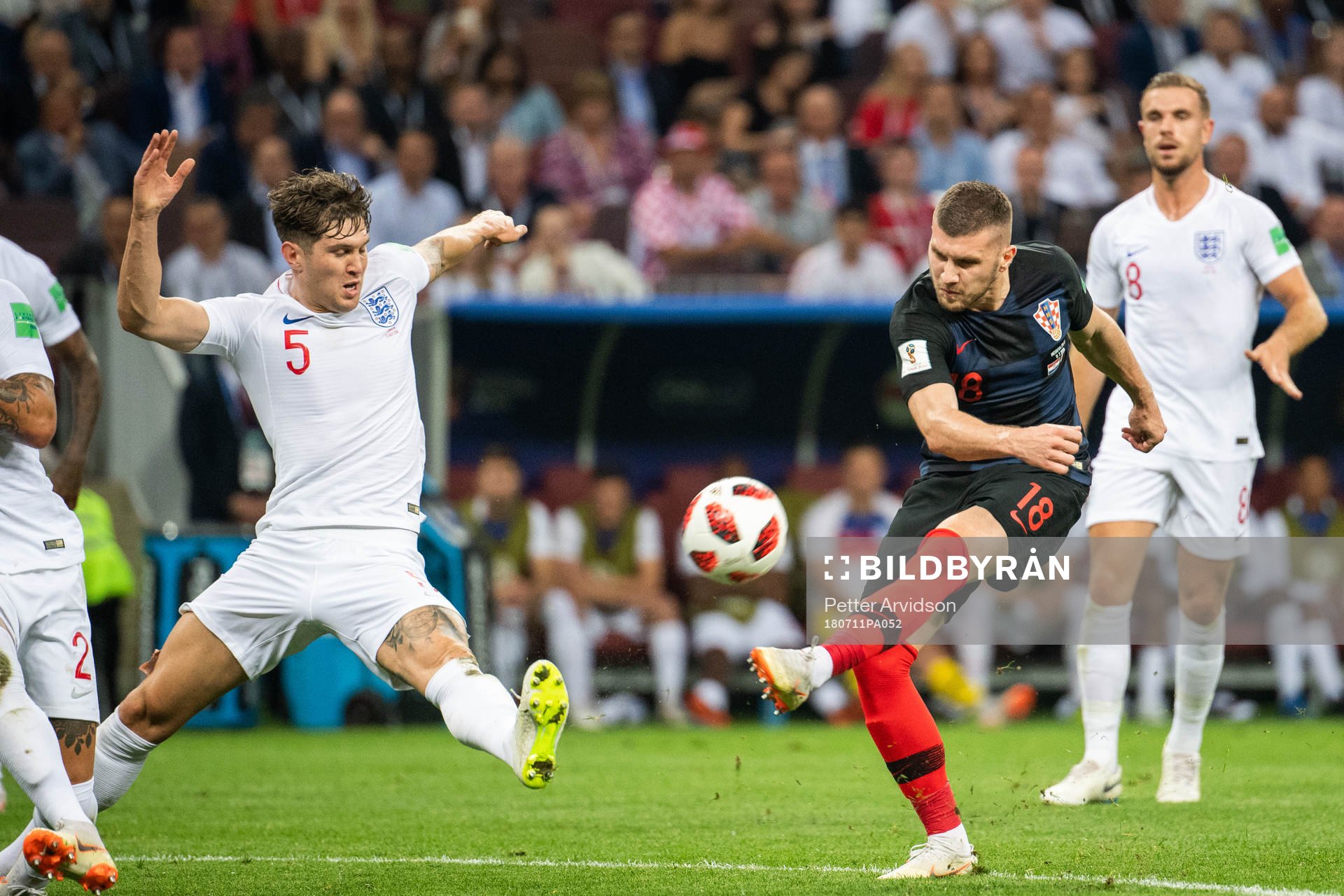 John Stones of England with a block against Ante Rebic of