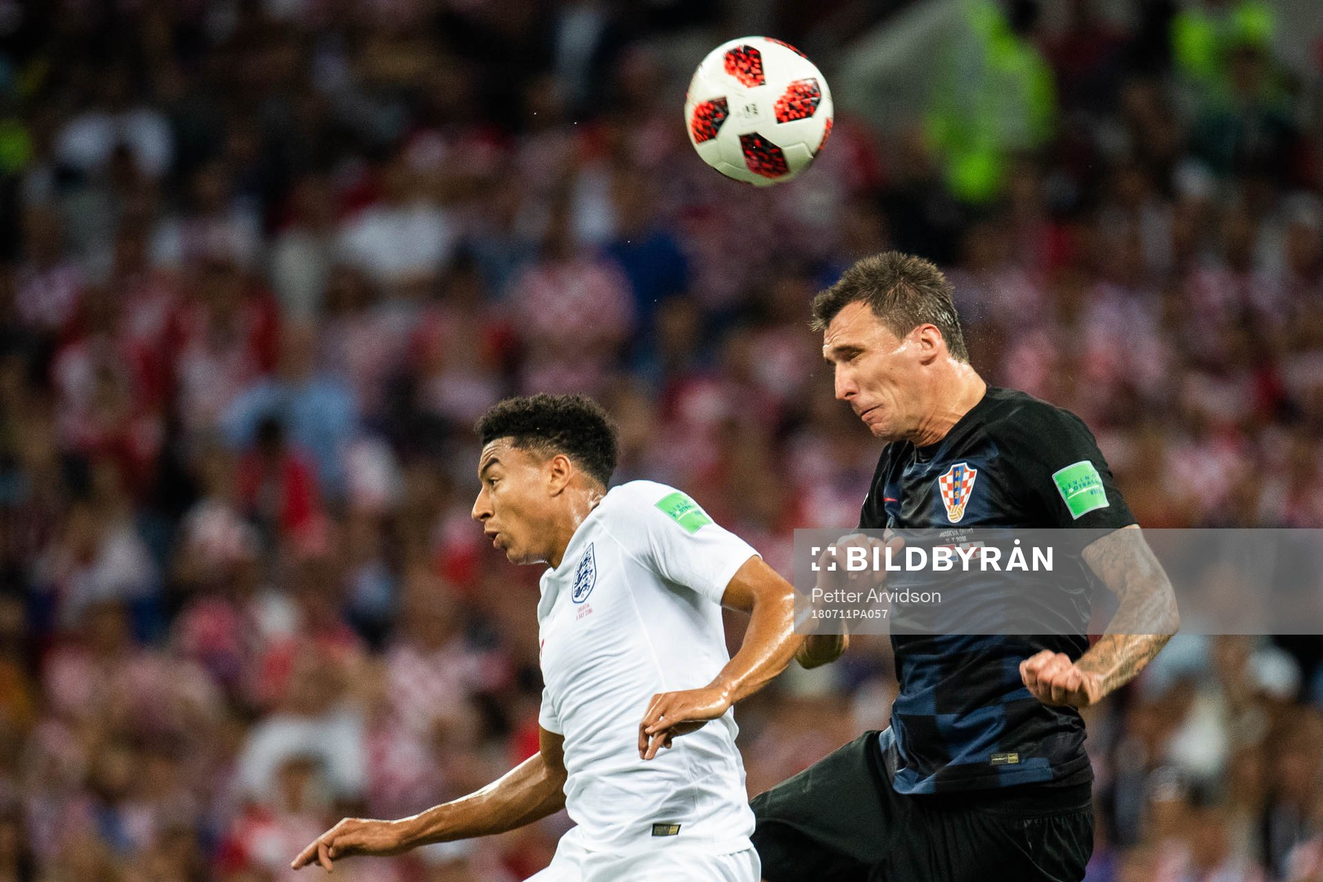 Jesse Lingard of England and Mario Mandzukic of Croatia