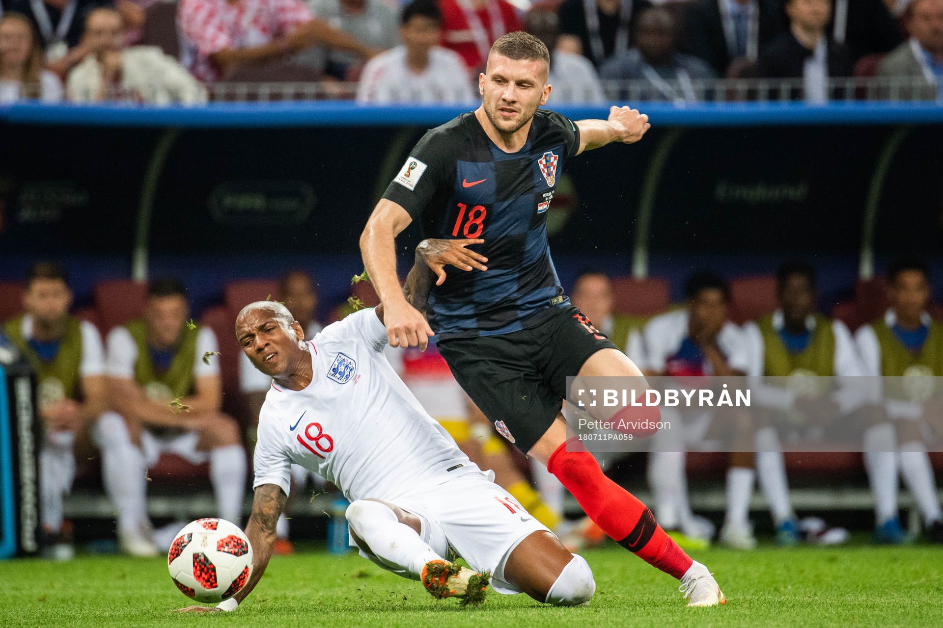 Ashley Young of England and Ante Rebic of Croatia competes for the ball during the FIFA World Cup semi final match between Croatia and England on July 11, 2018 in Moscow.