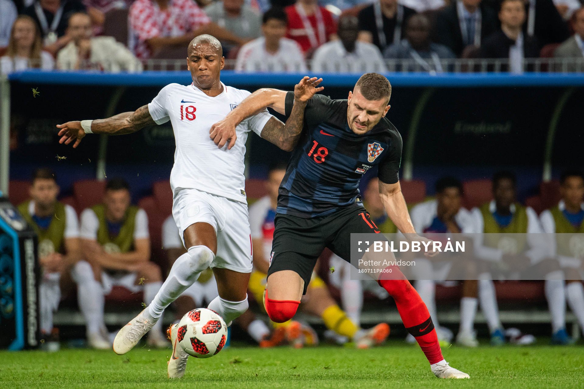 Ashley Young of England and Ante Rebic of Croatia competes