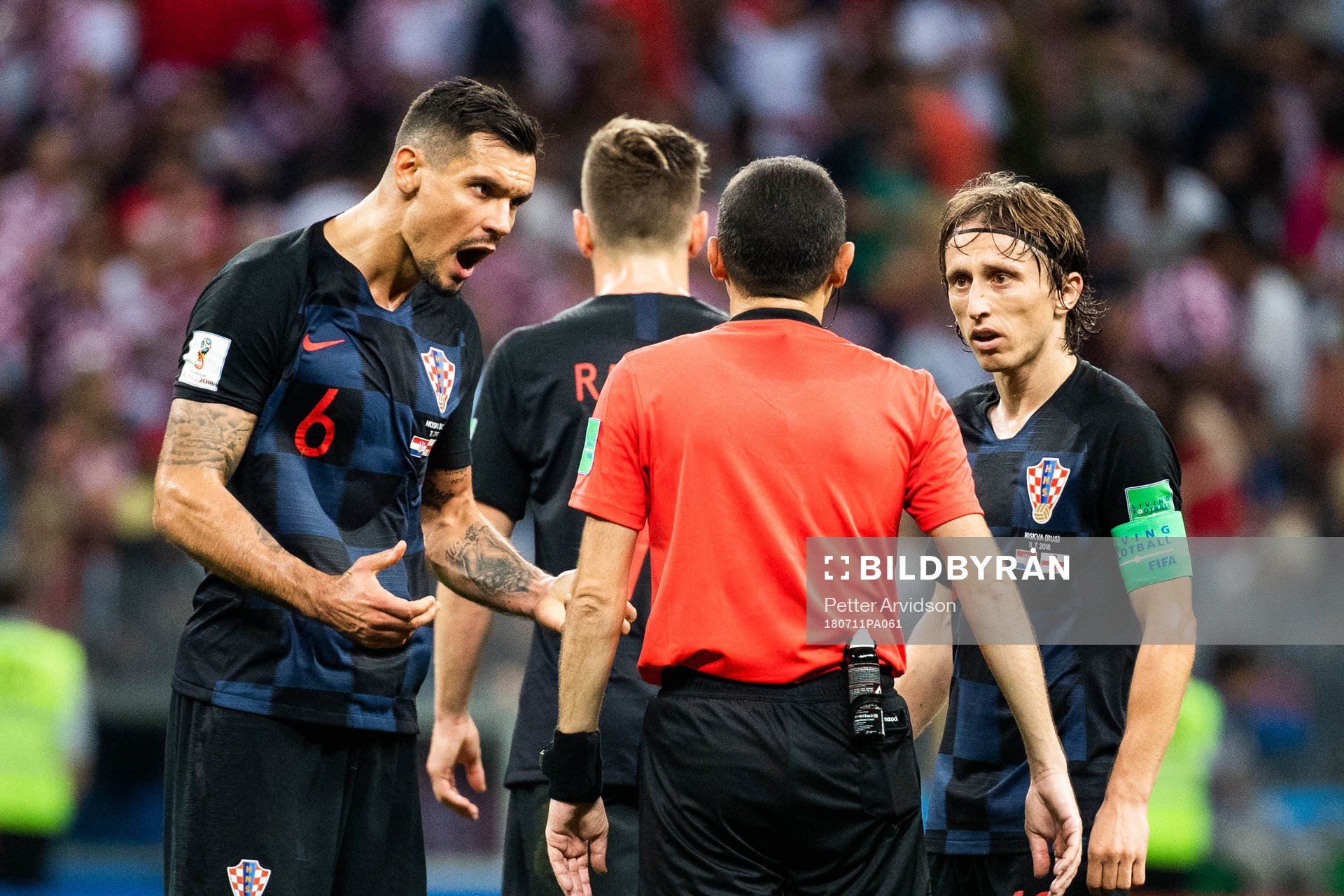 Dejan Lovren and Luka Modric of Croatia in a discussion