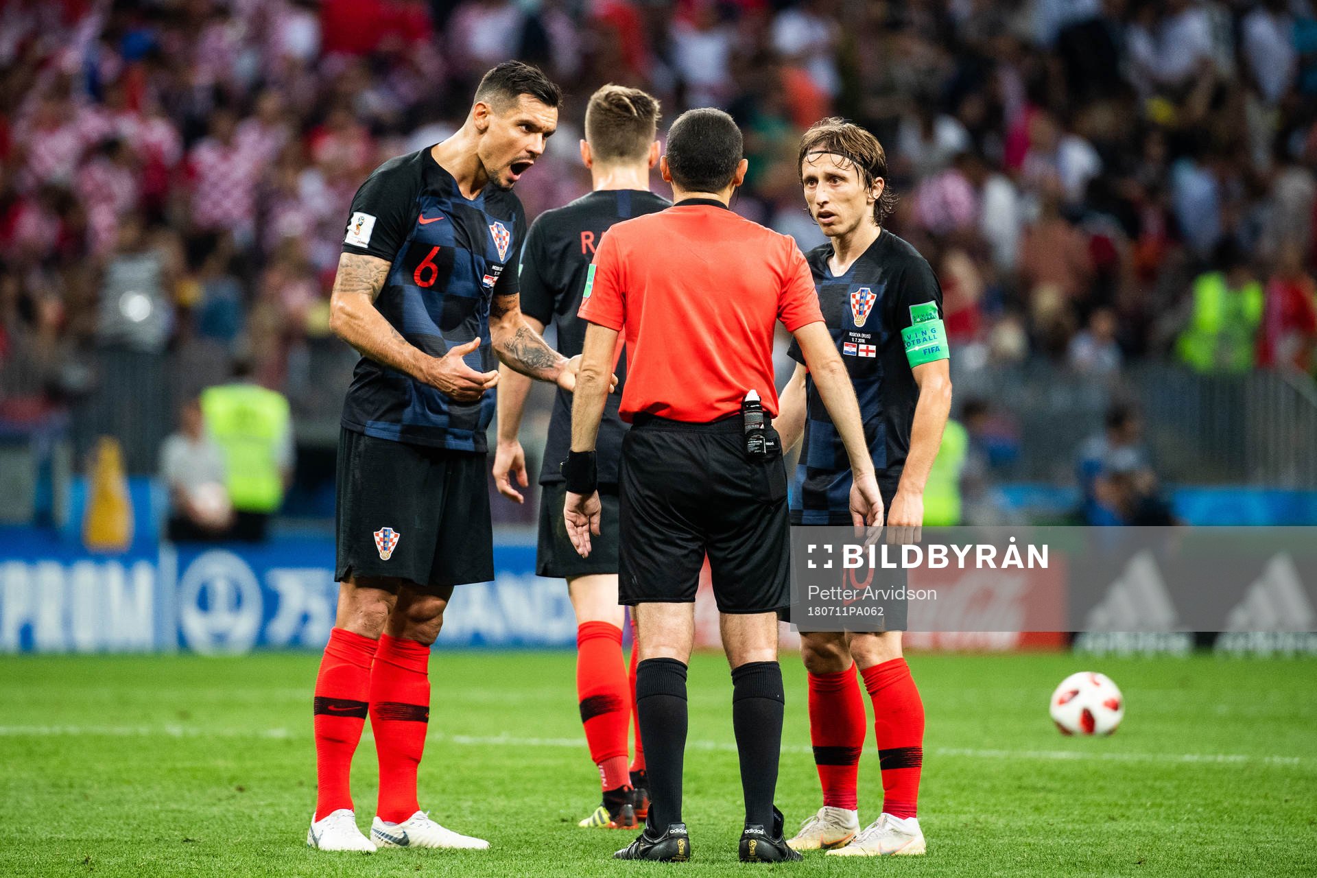 Dejan Lovren and Luka Modric of Croatia in a discussion