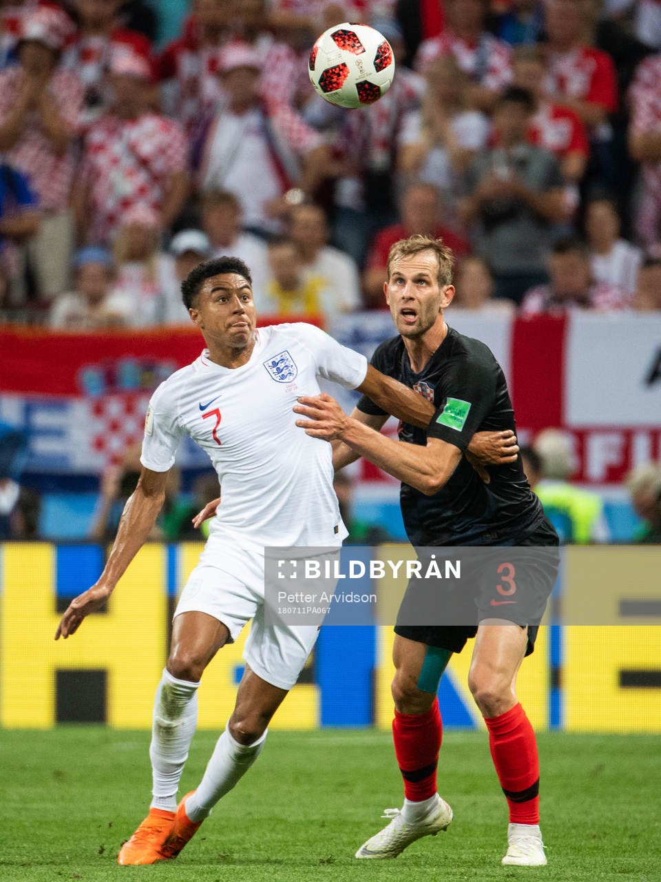 Jesse Lingard of England and Ivan Strinic of Croatia