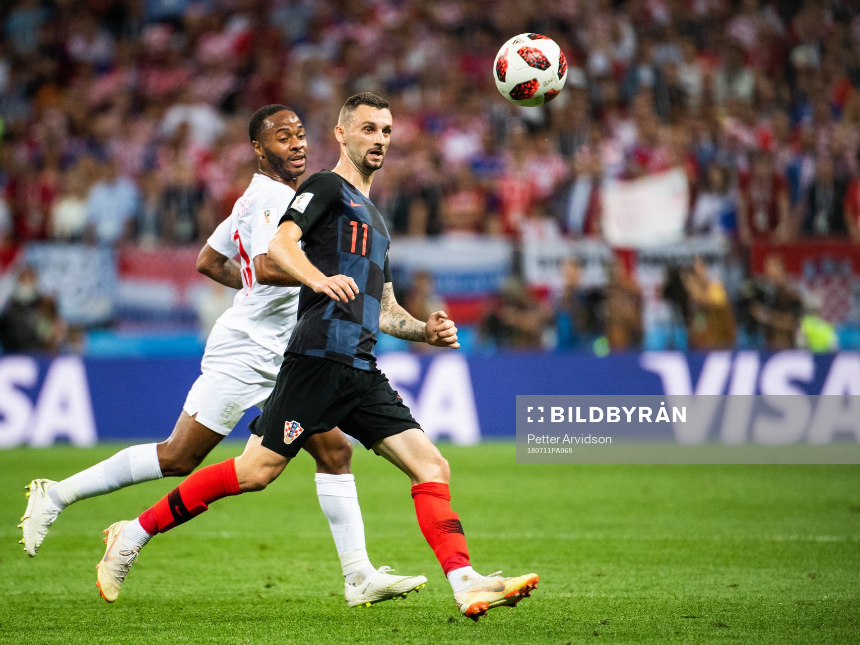 Raheem Sterling of England and Marcelo Brozovic of Croatia