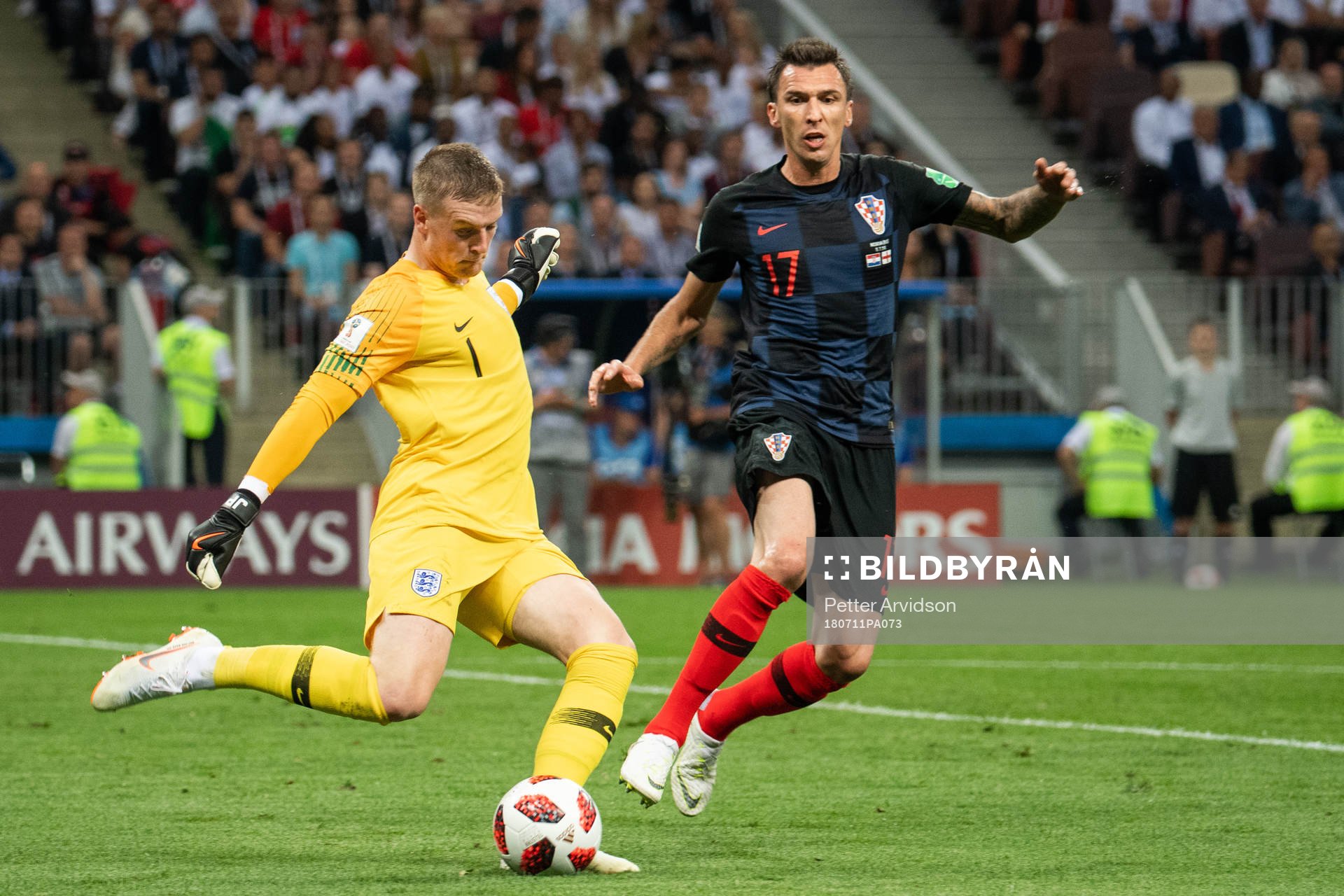 goalkeeper Jordan Pickford of England and Mario Mandzukic