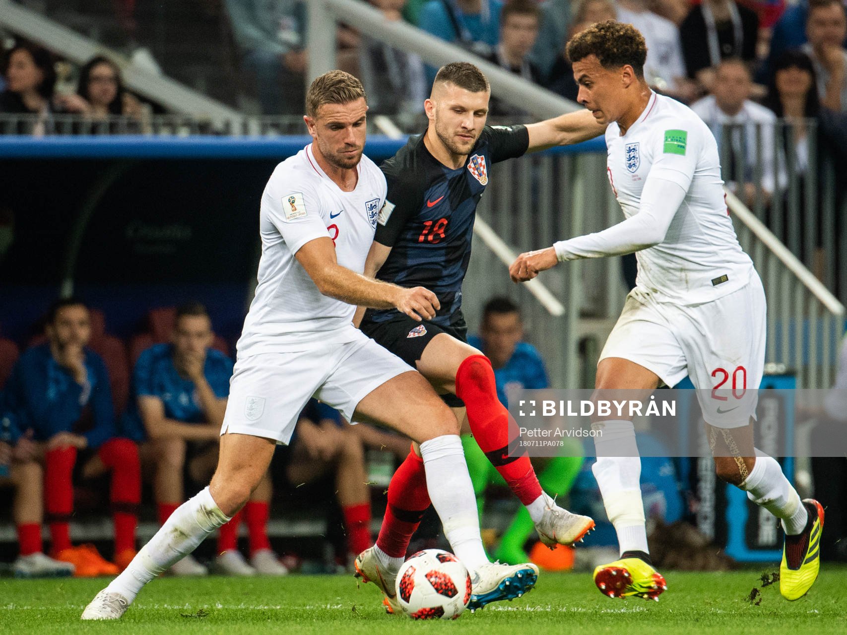 Jordan Henderson and Dele Alli of England competes for the