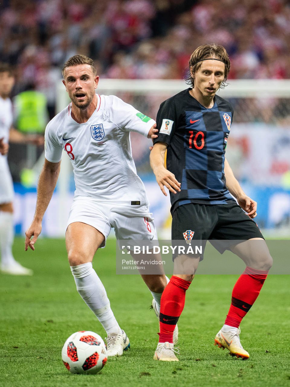 Jordan Henderson of England and Luka Modric of Croatiain