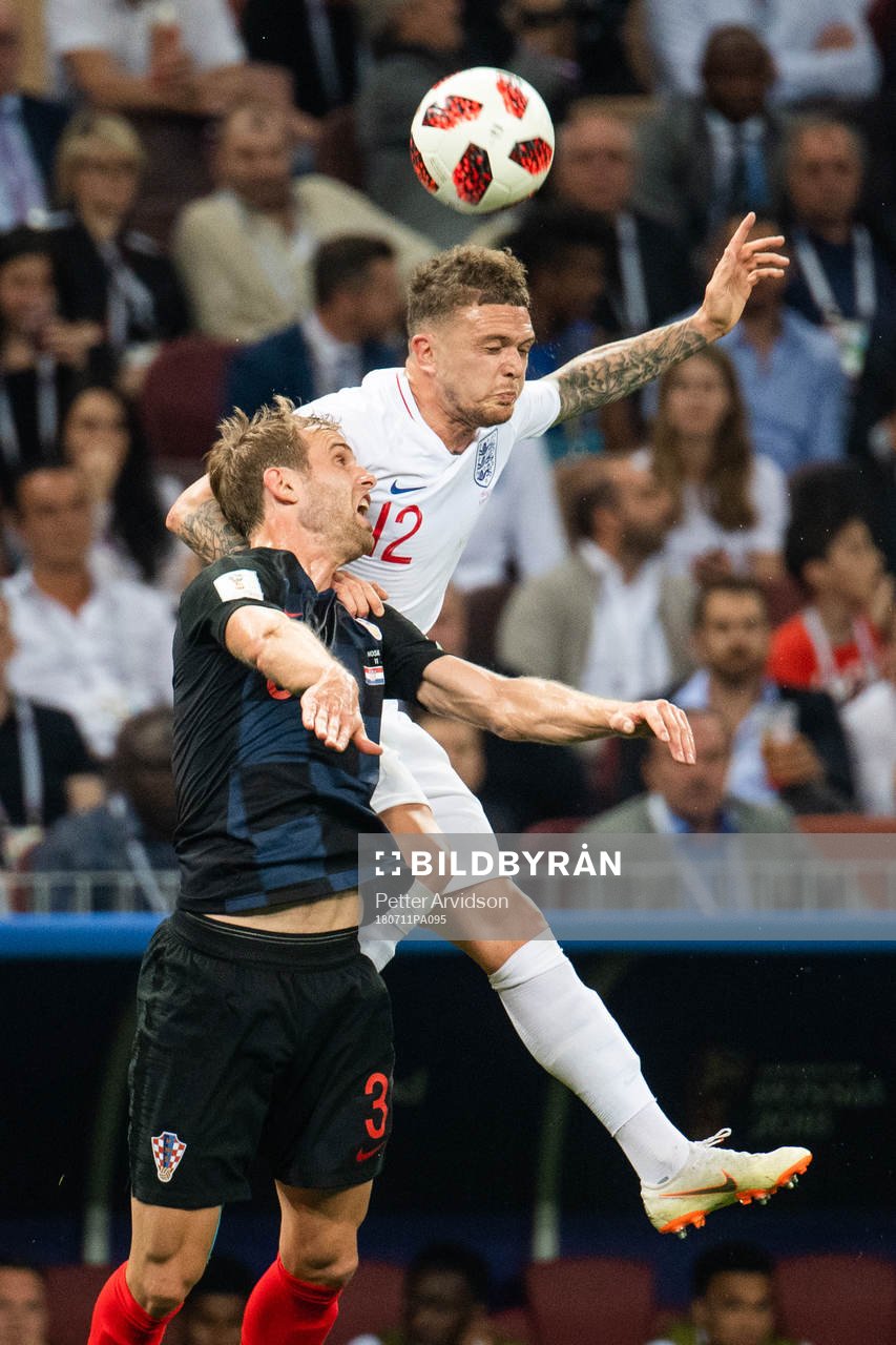 Kieran Trippier of England and Ivan Strinic of Croatia