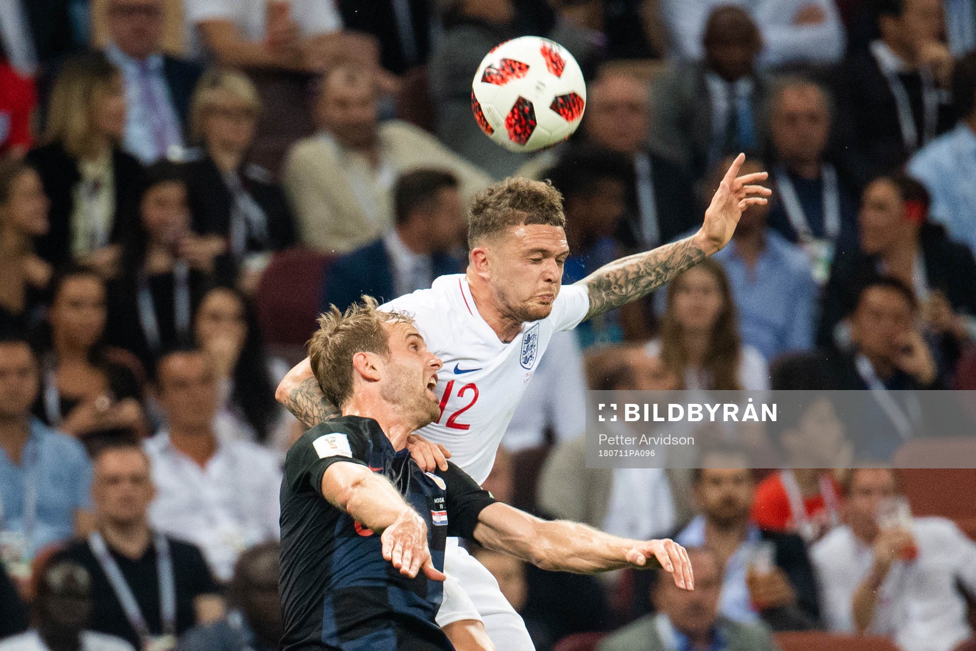 Kieran Trippier of England and Ivan Strinic of Croatia