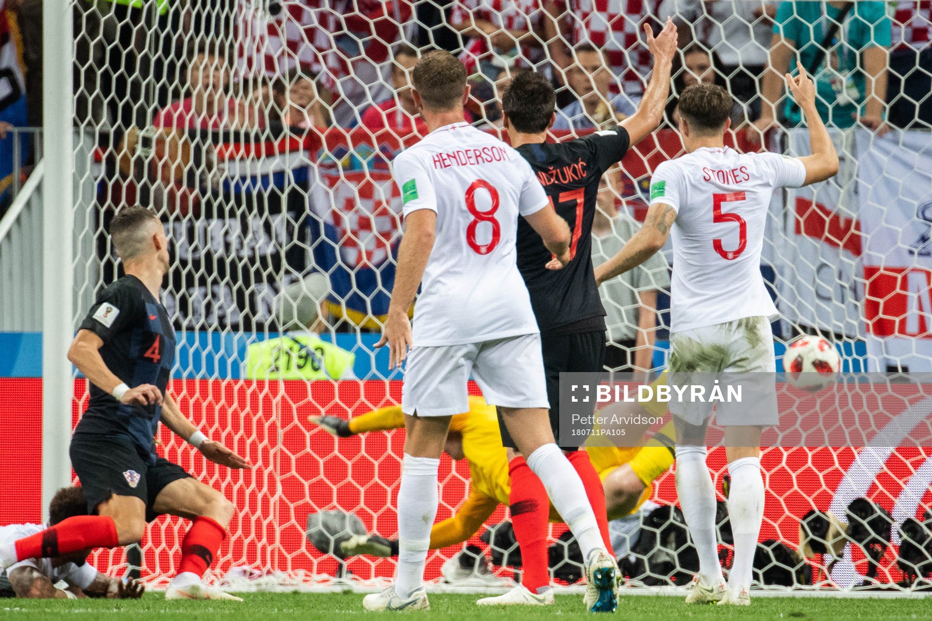 Ivan Perisic of Croatia (left) scores 1-1
