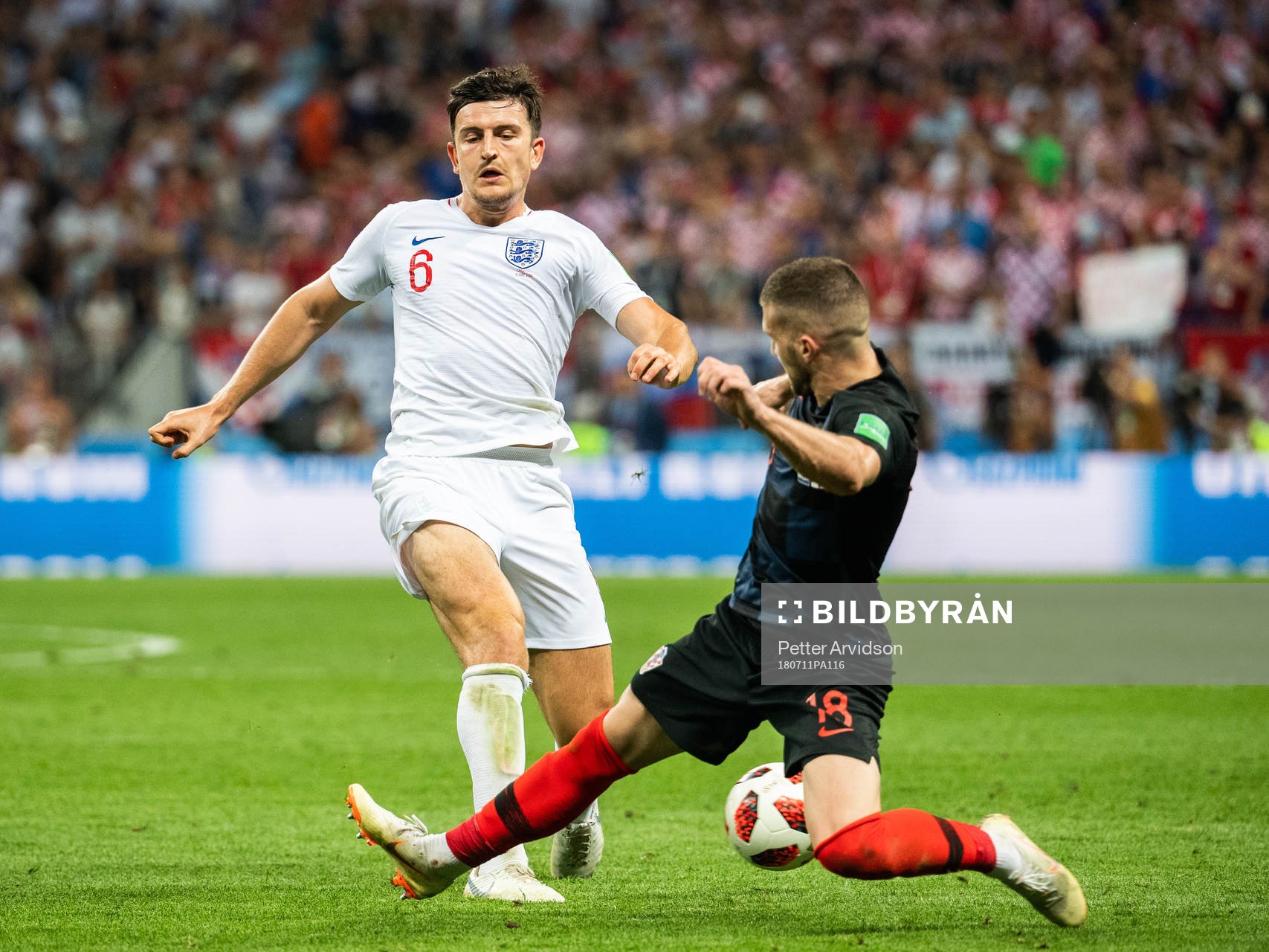Harry Maguire of England and Ante Rebic of Croatia