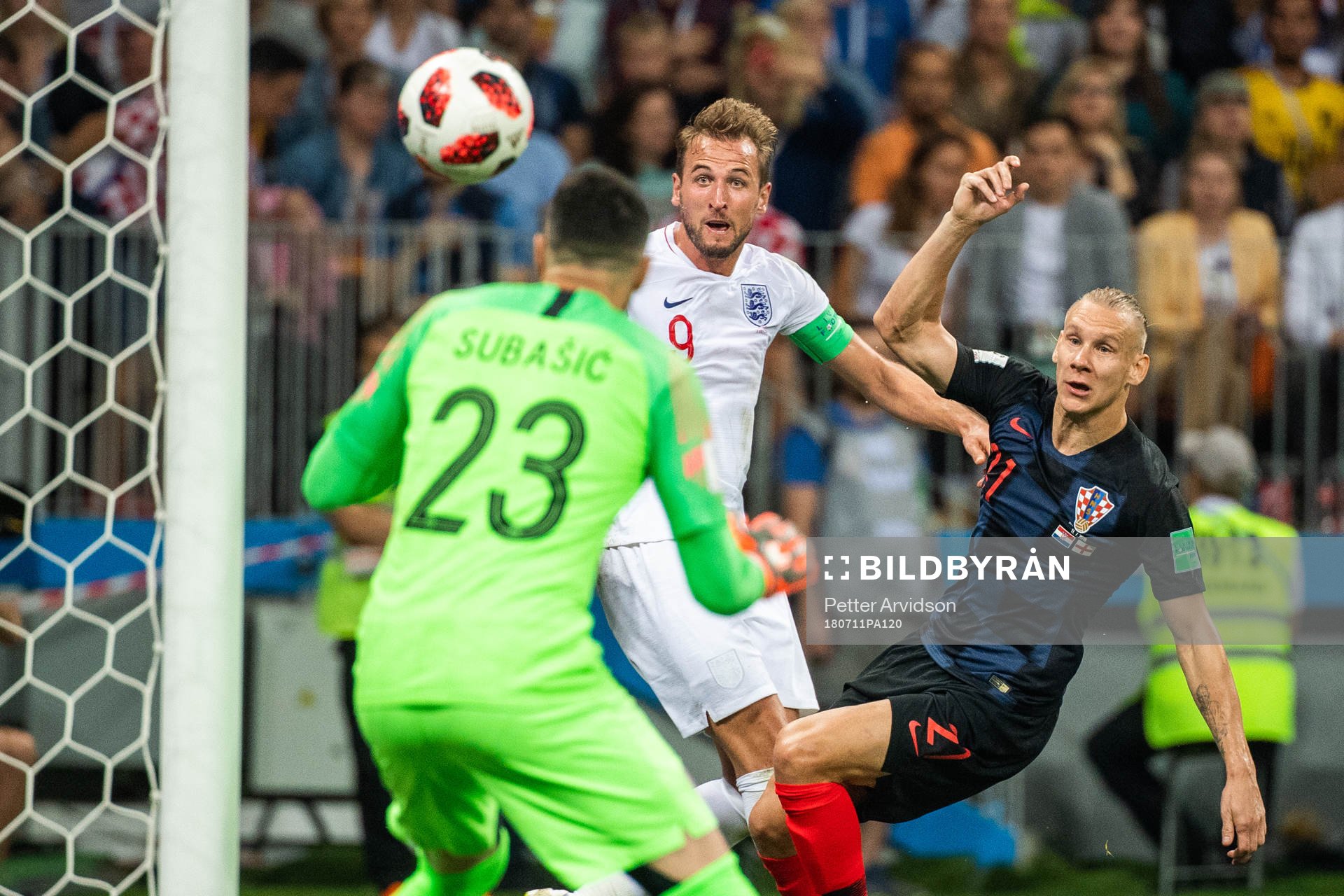 Domagoj Vida of Croatia defends against Harry Kane of