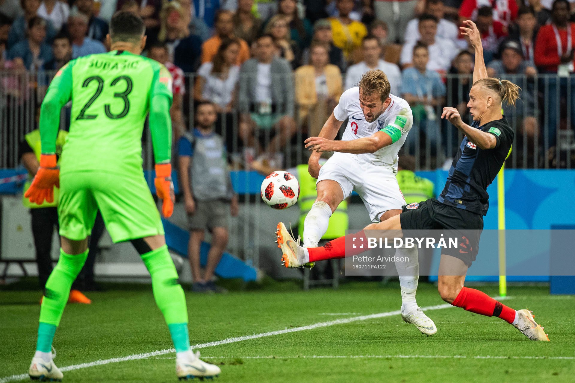 Domagoj Vida of Croatia defends against Harry Kane of