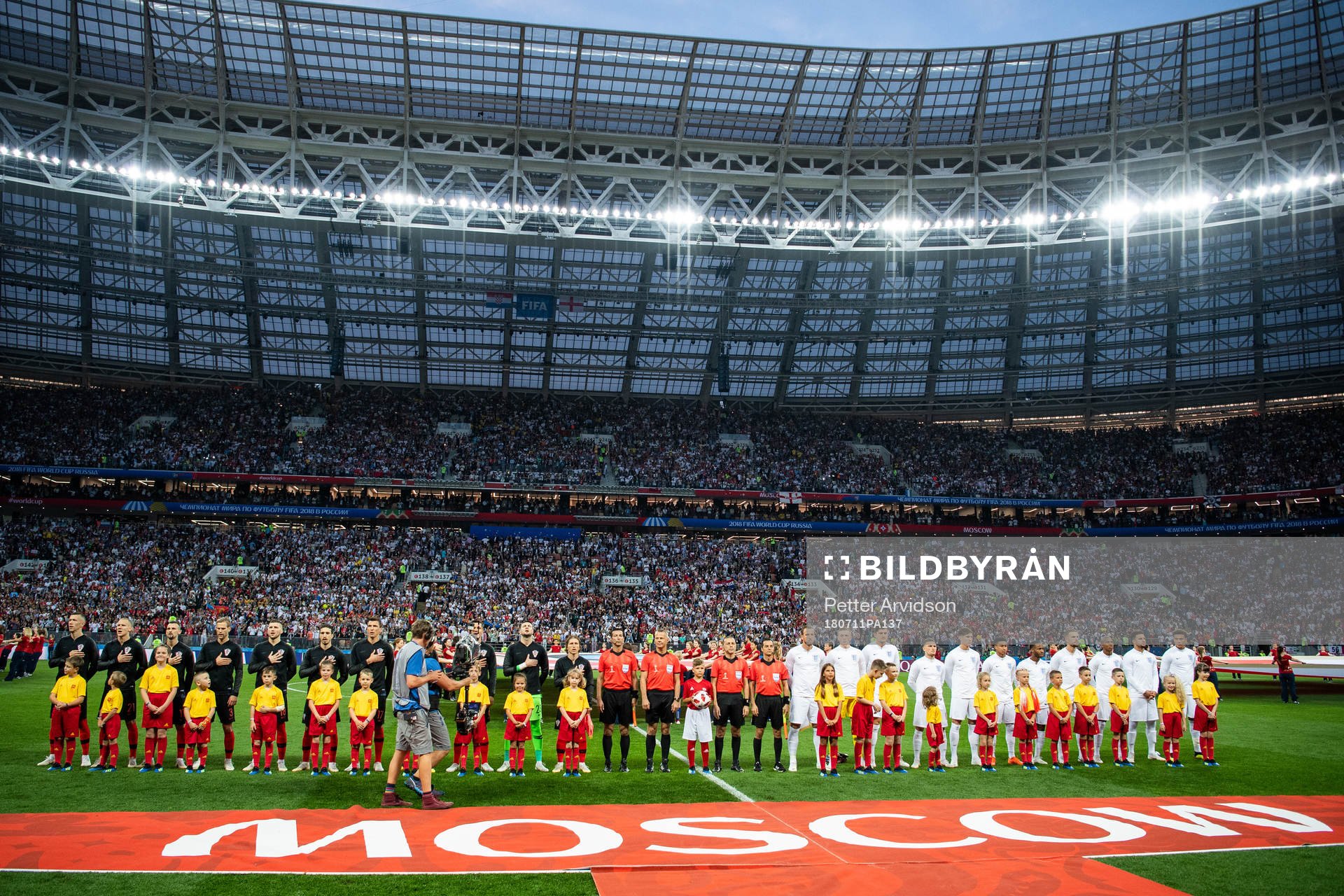 Players of Croatia and of England line up prior to the FIFA