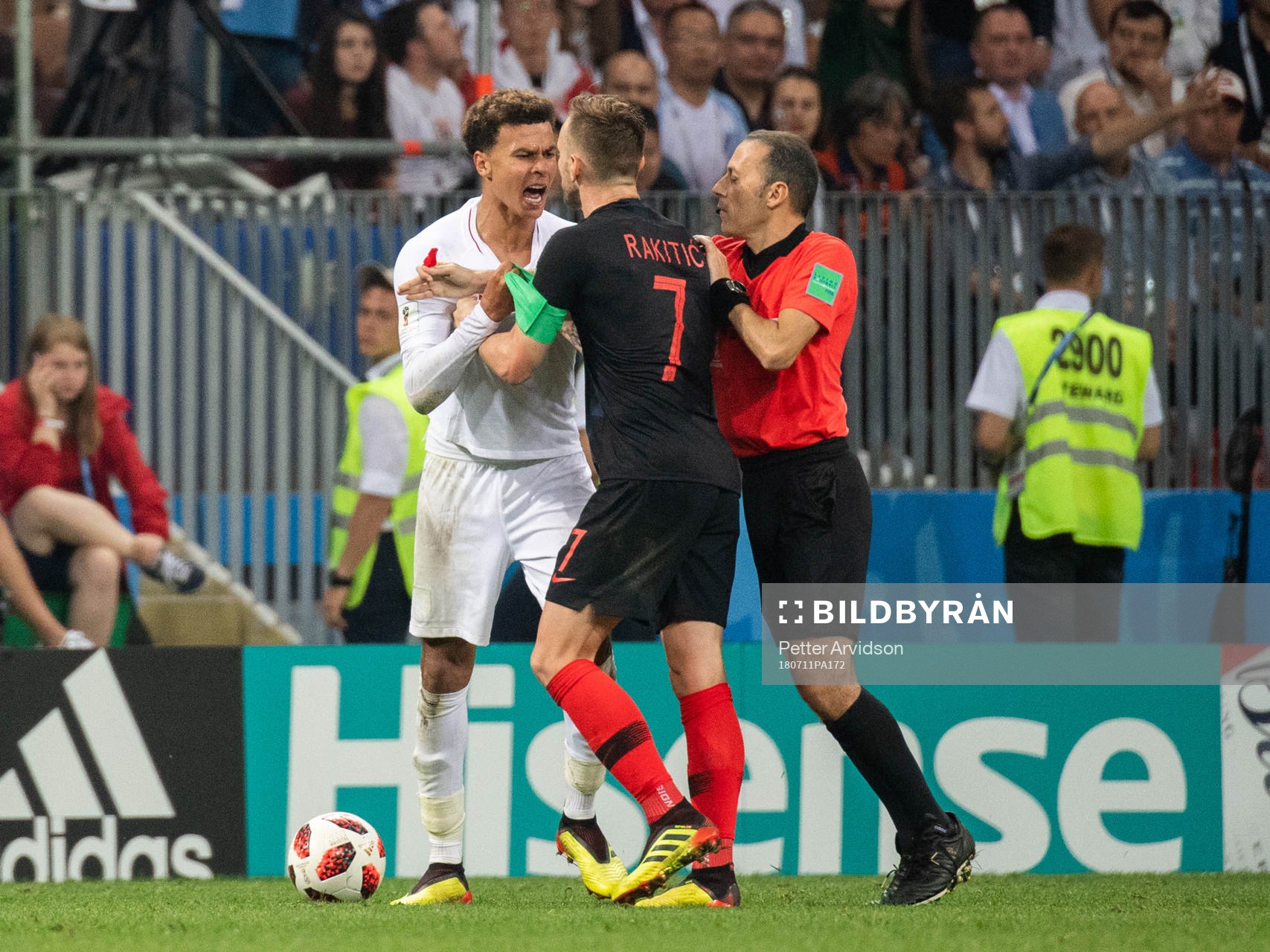 Irritated between Dele Alli of England and Ivan Rakitic of
