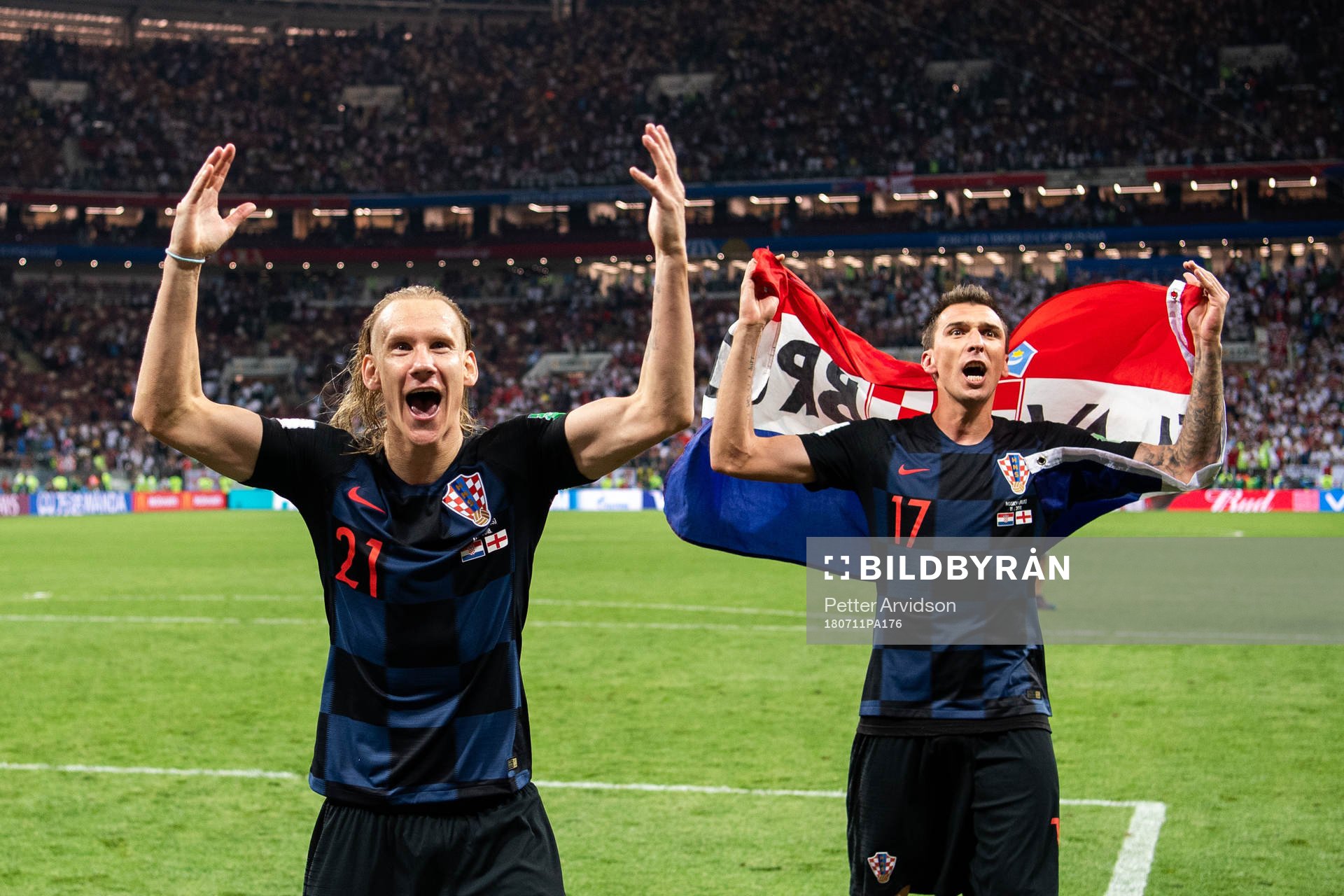 Domagoj Vida and Mario Mandzukic of Croatia cdlebrate