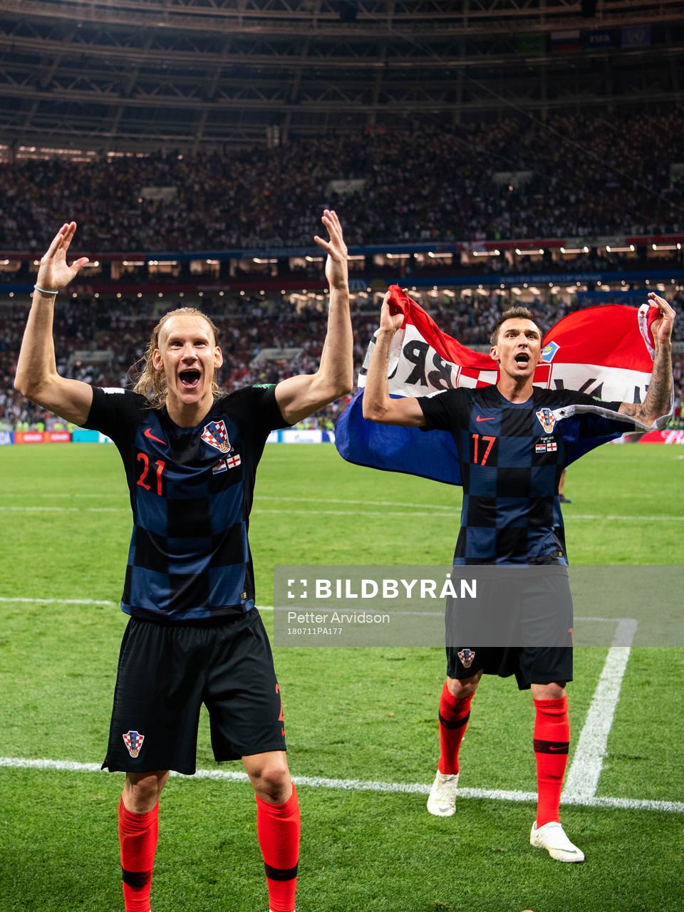 Domagoj Vida and Mario Mandzukic of Croatia cdlebrate
