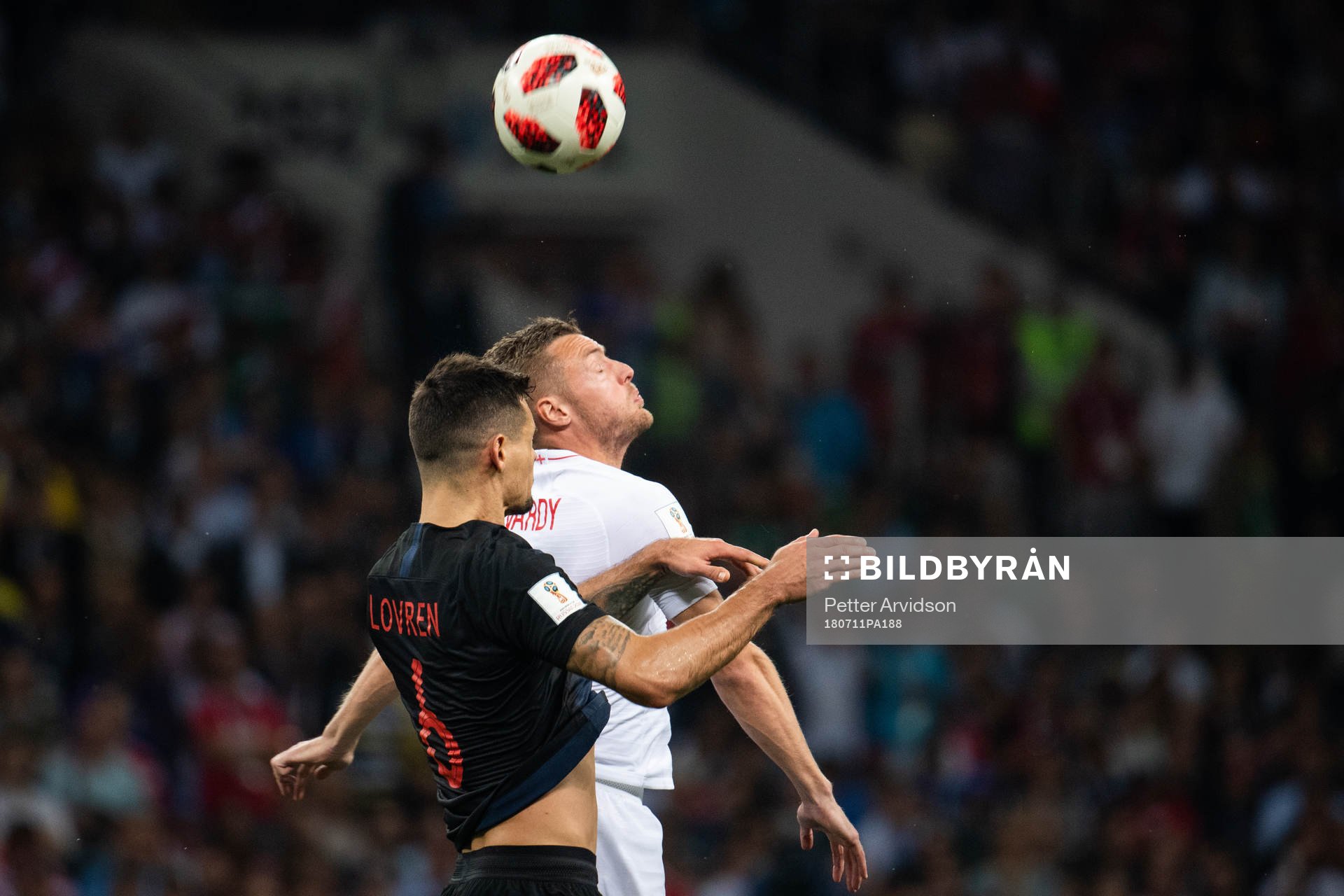 Jamie Vardy of England and Dejan Lovren of Croatia competes