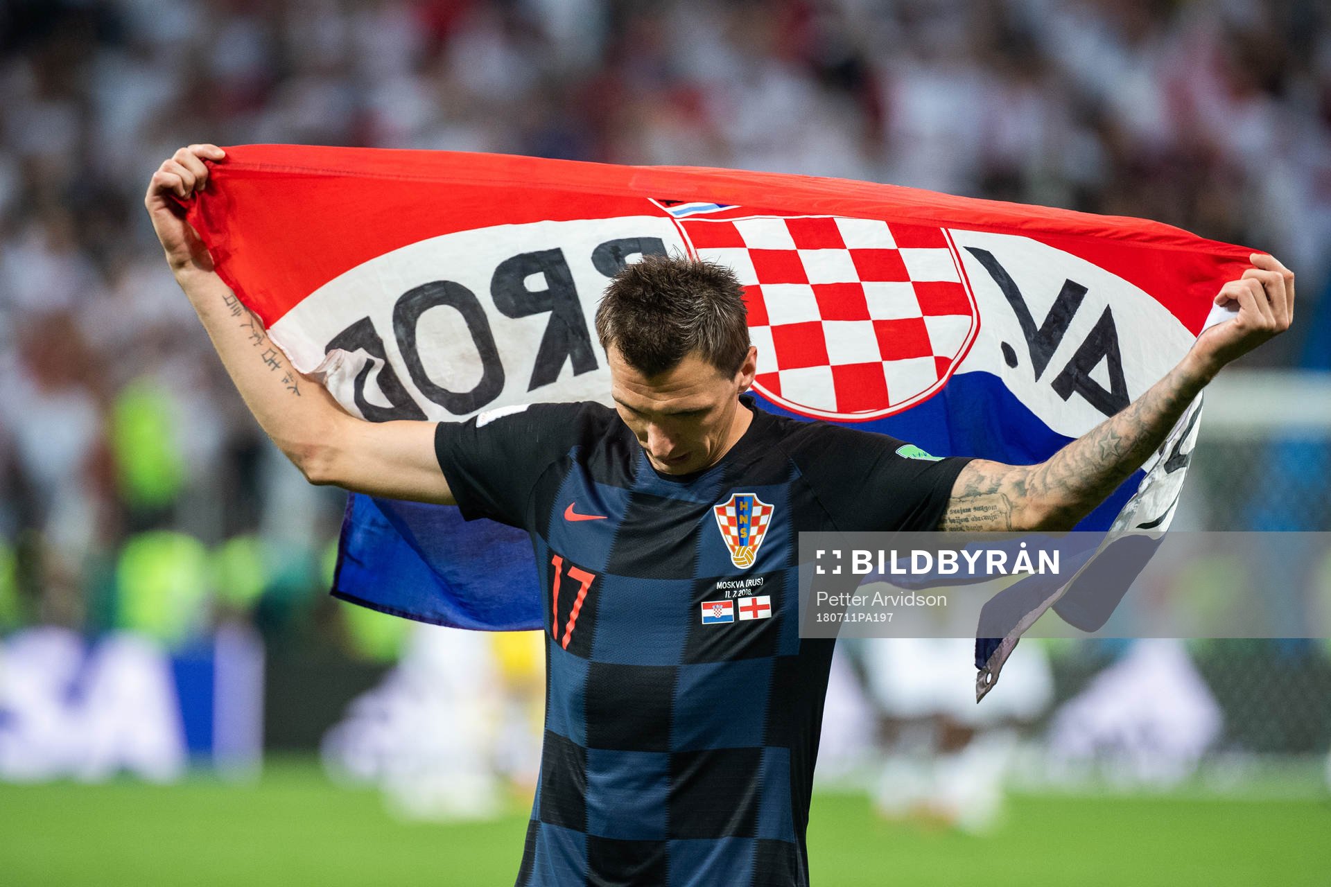 Mario Mandzukic of Croatia celebrate with a flag