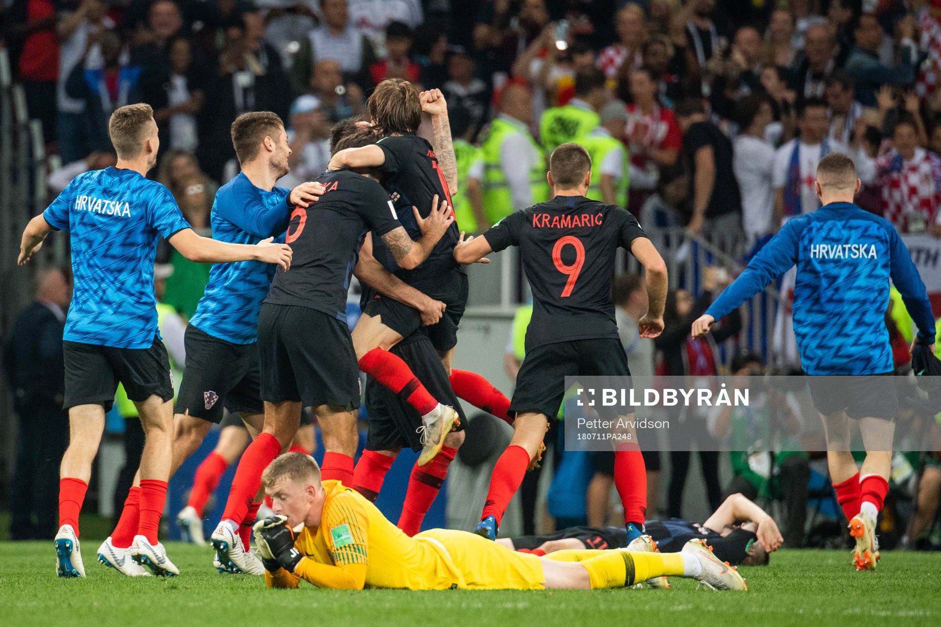 goalkeeper Jordan Pickford of England looks dejected while