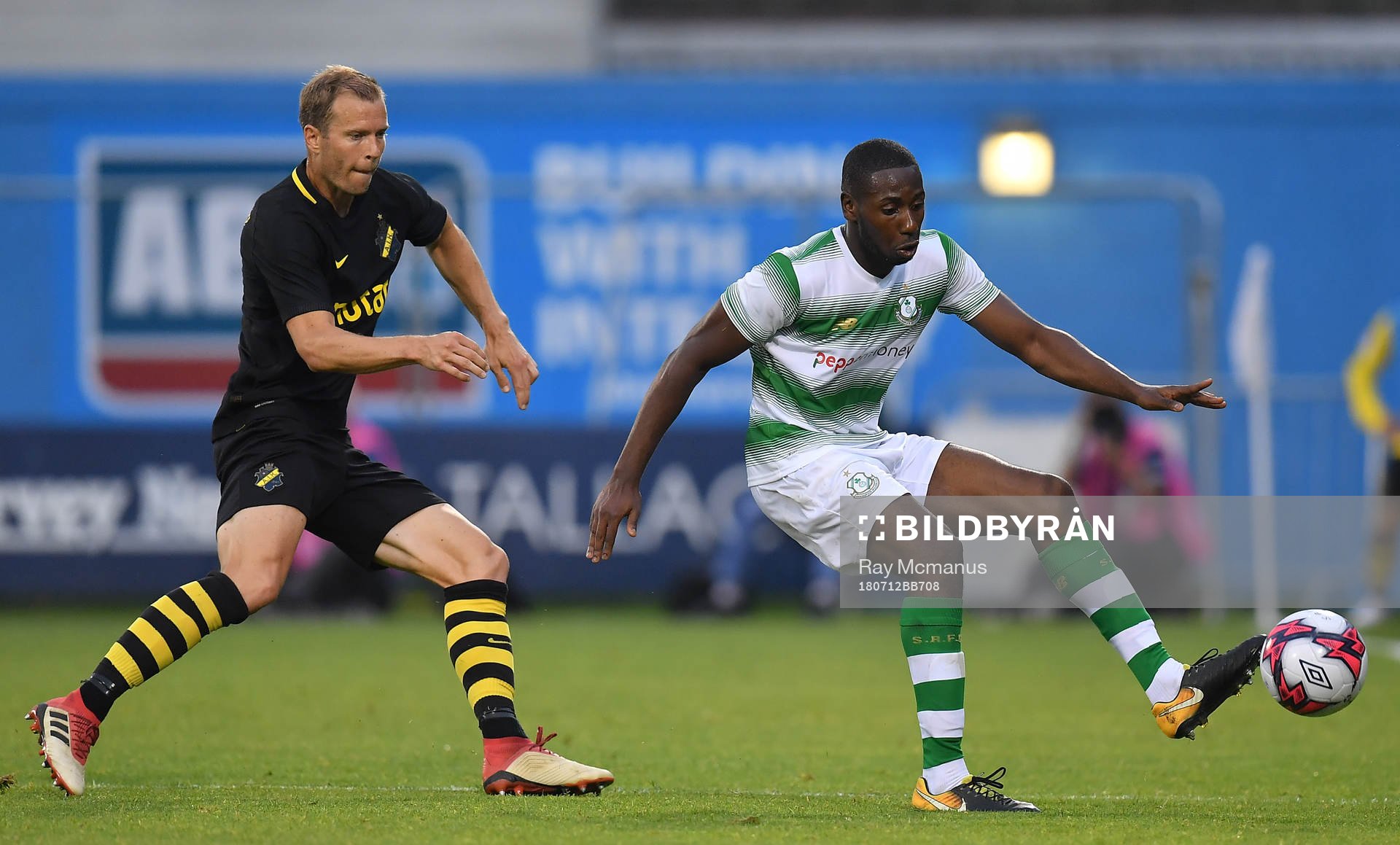 Dan Carr of Shamrock Rovers in action against Per Karlsson