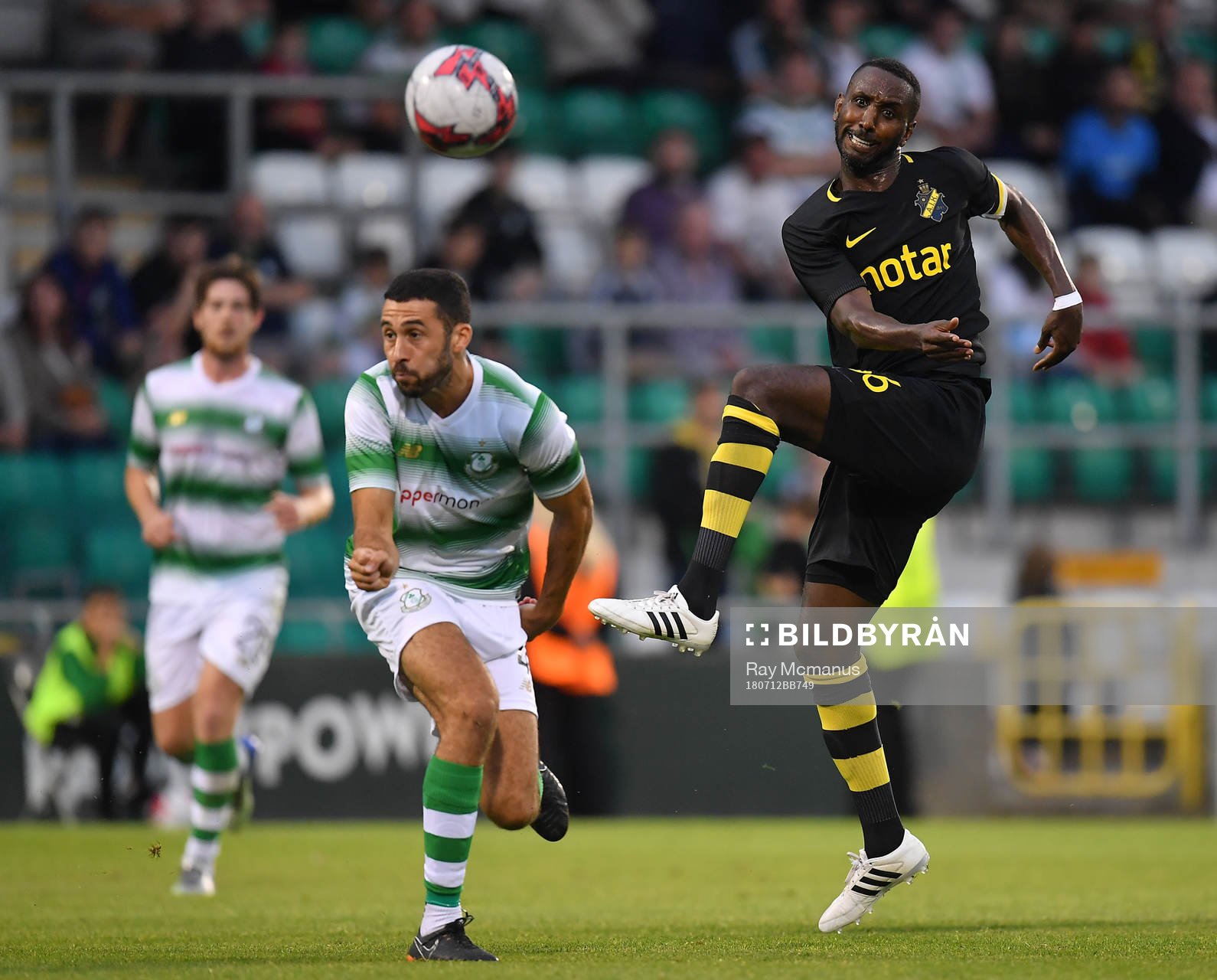 Henok Goitom of AIK in action against Roberto Lopes of