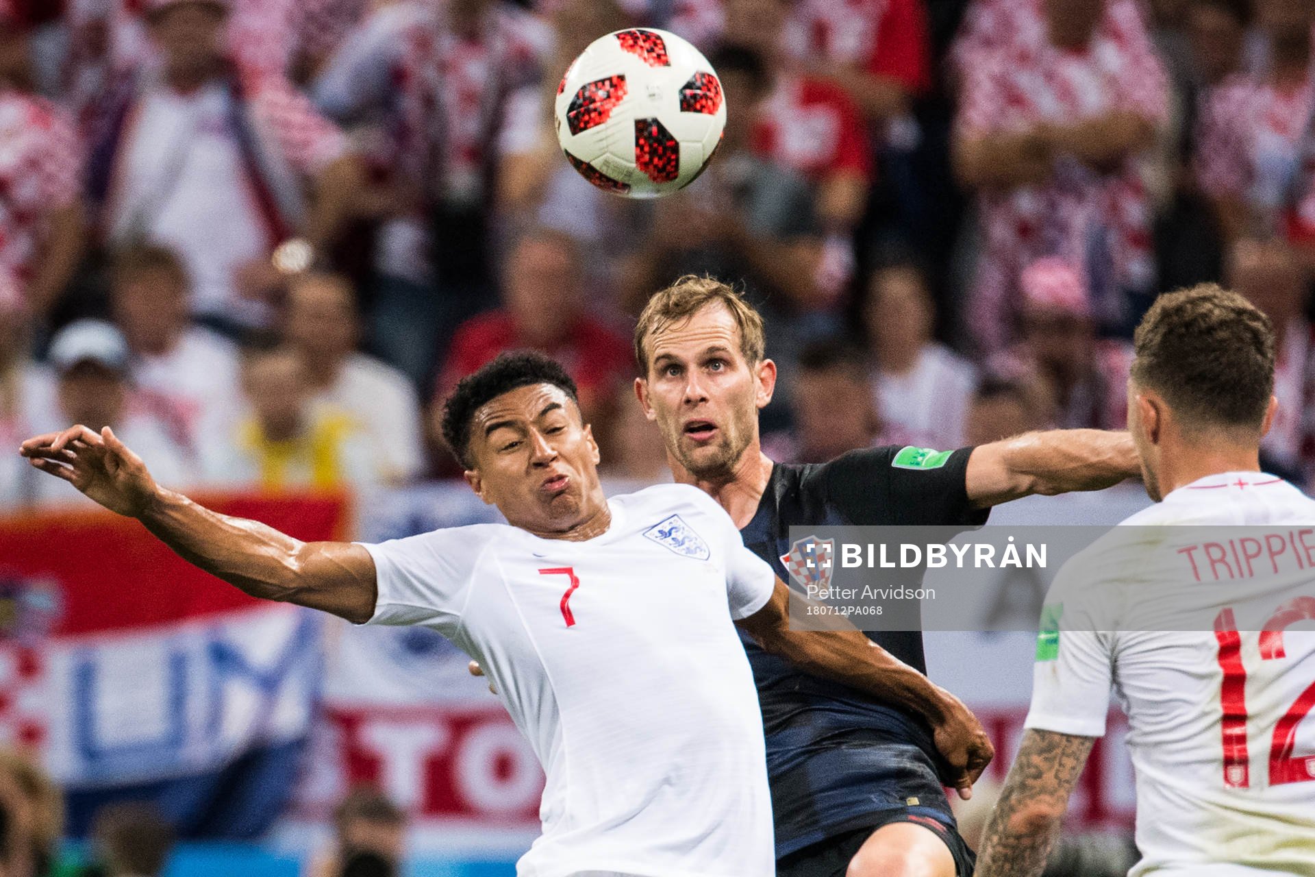 Jesse Lingard of England and Ivan Strinic of Croatia