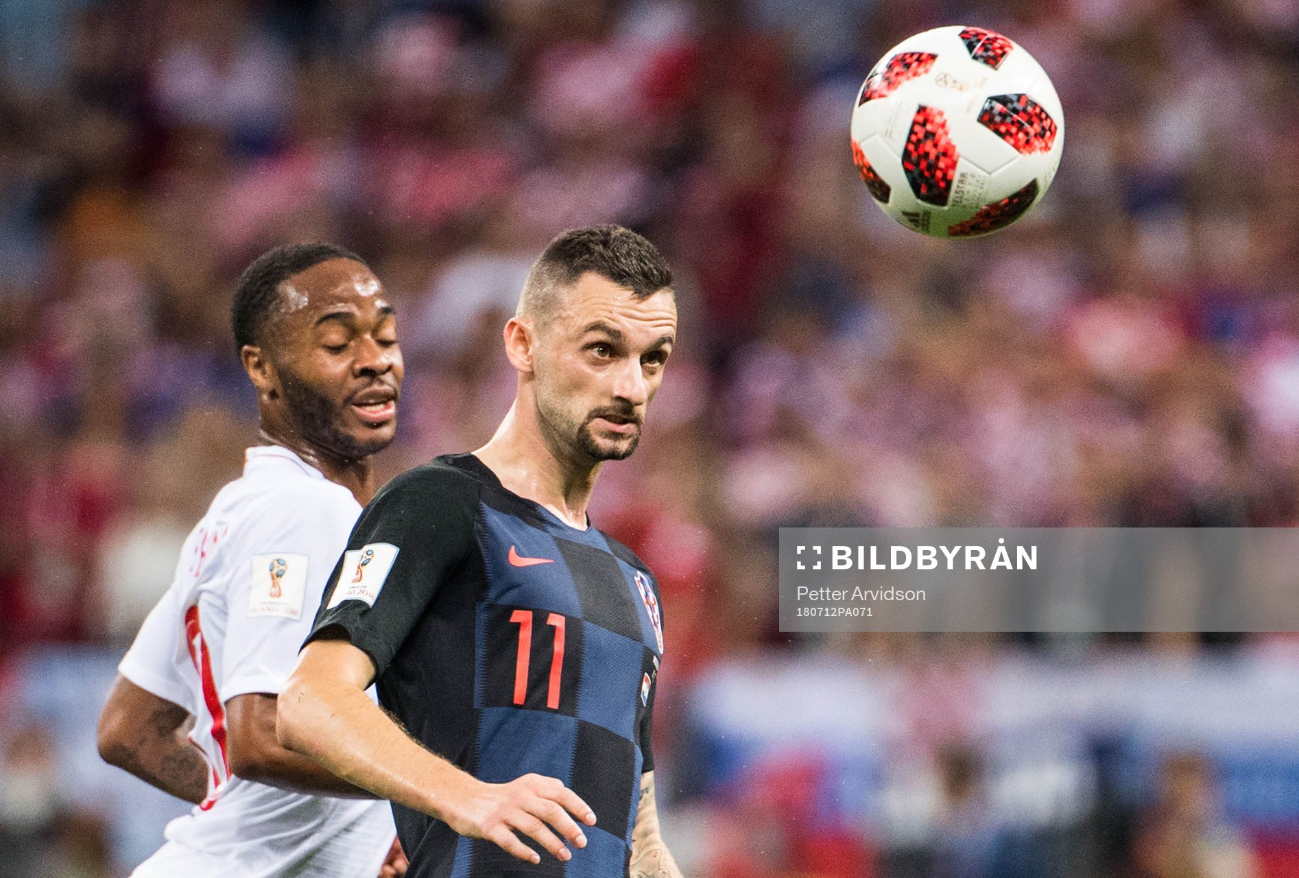 Marcelo Brozovic of Croatia and Raheem Sterling of England