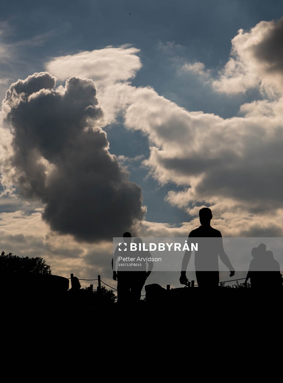 General view of people in silhouettes