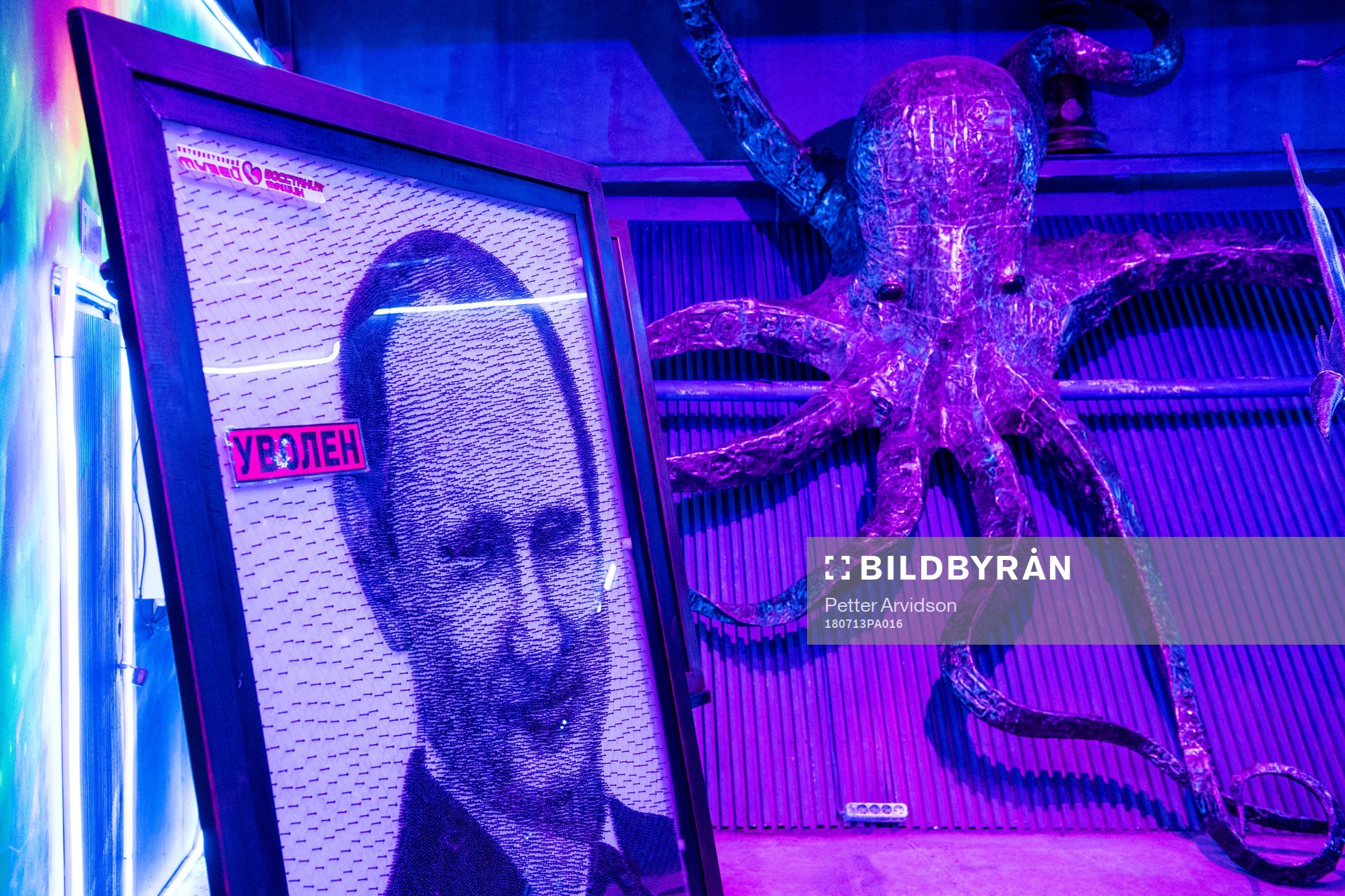 A picture of Russia President Vladimir Putin beside a