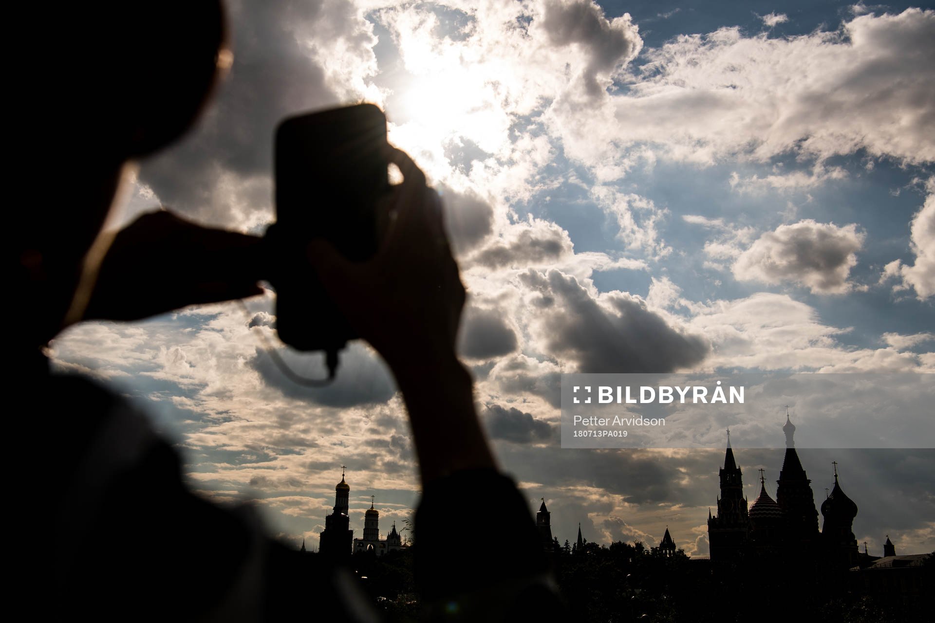 People take pictures of Saint Basil's Cathedral