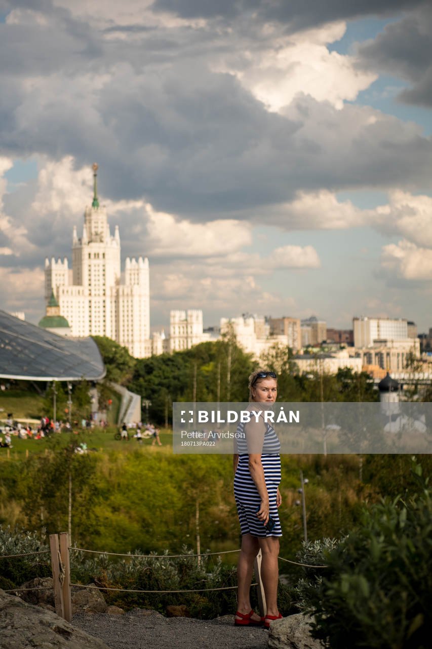 A women is seen in a park in central Moscow