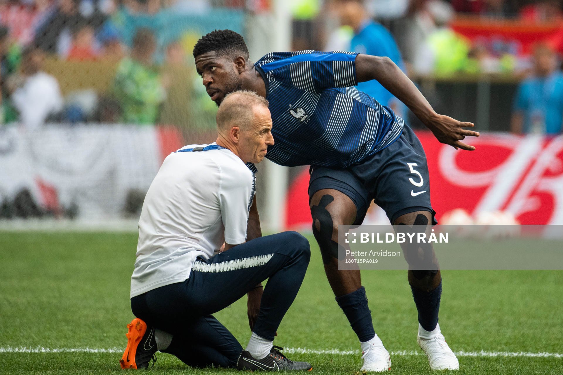 Samuel Umtiti of France gets medical attention