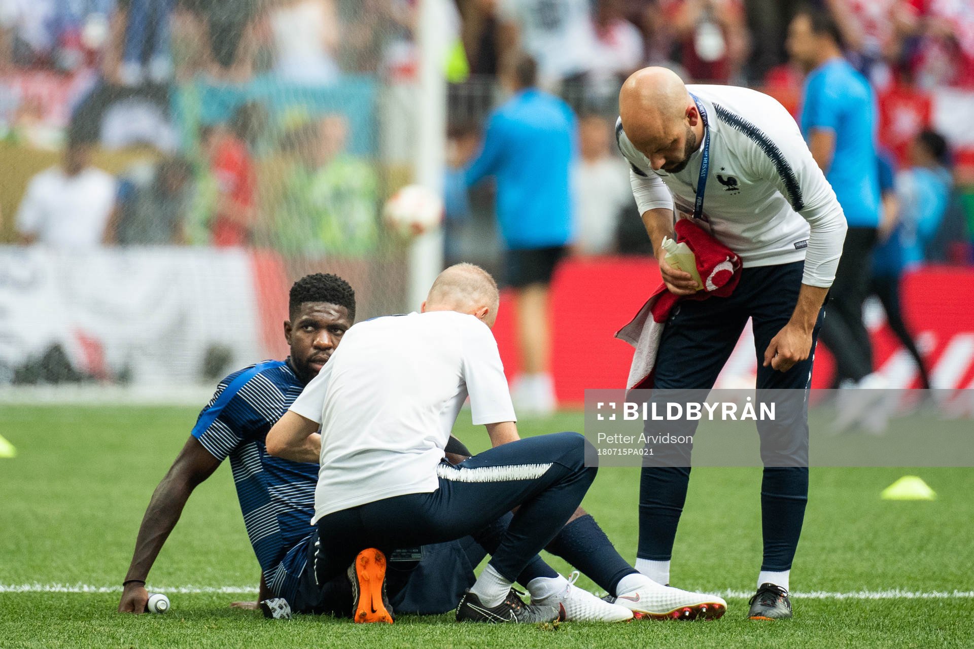 Samuel Umtiti of France gets medical attention