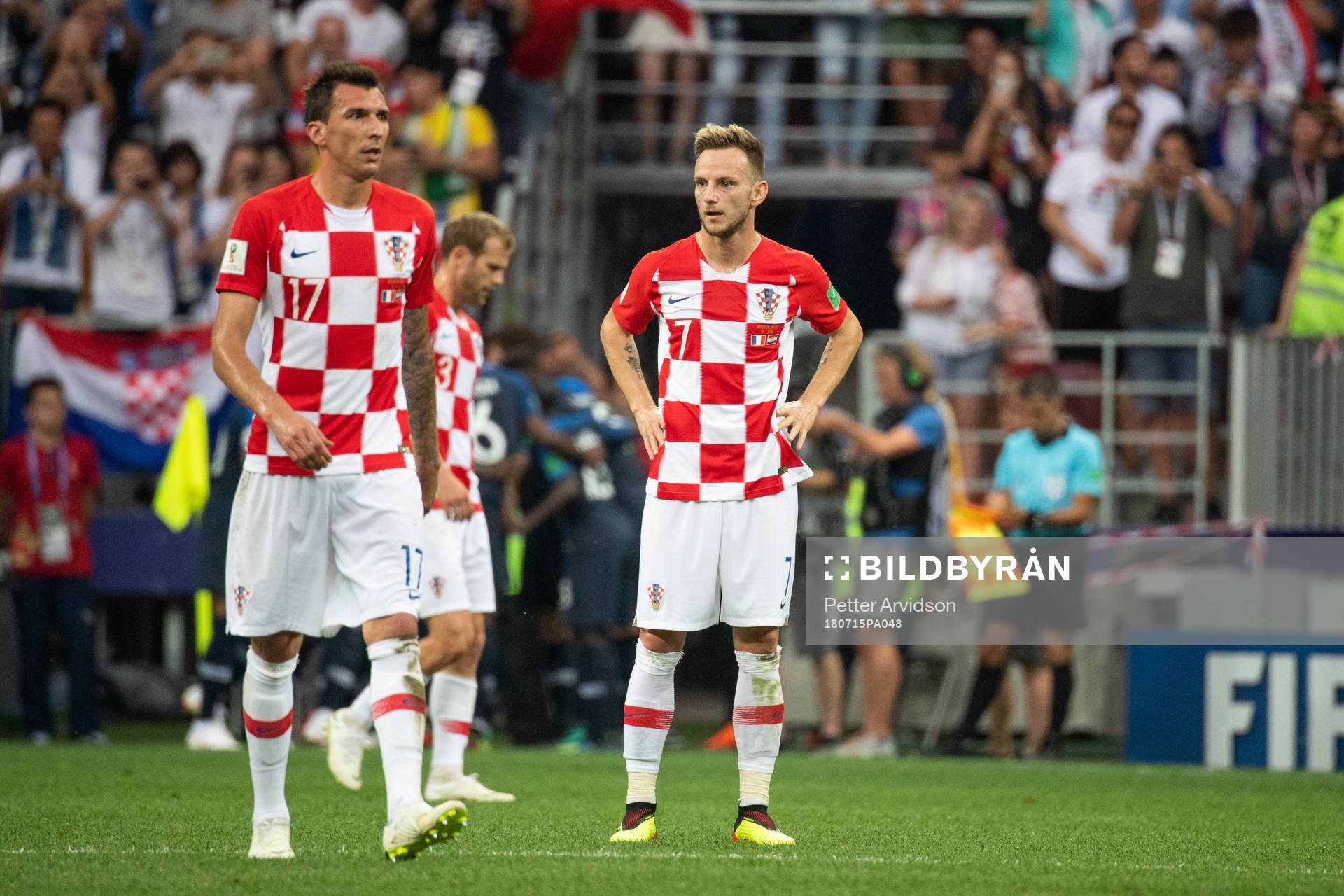 Ivan Rakitic of Croatia looks dejected