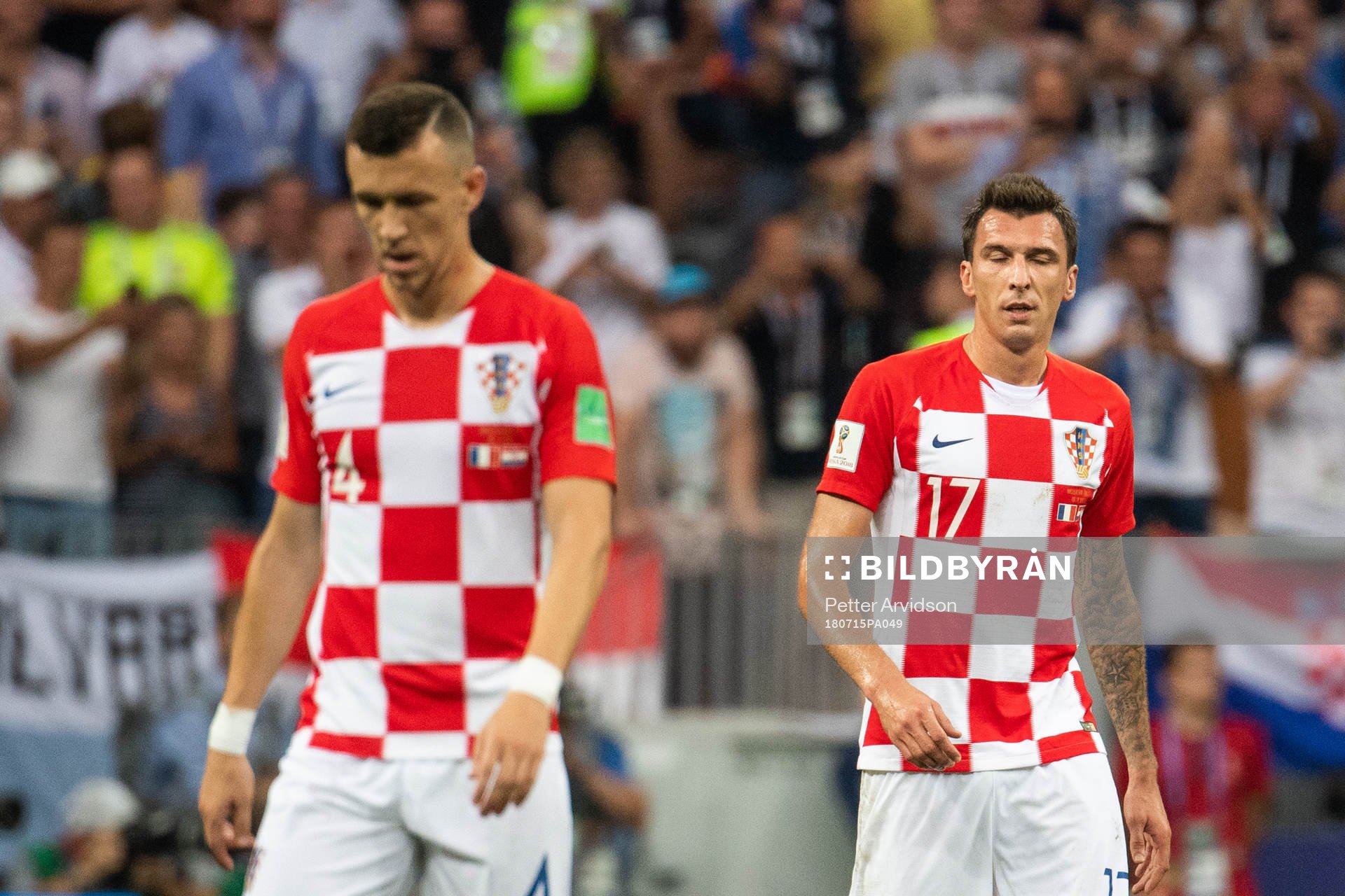 Mario Mandzukic and Ivan Perisic of Croatia looks dejected