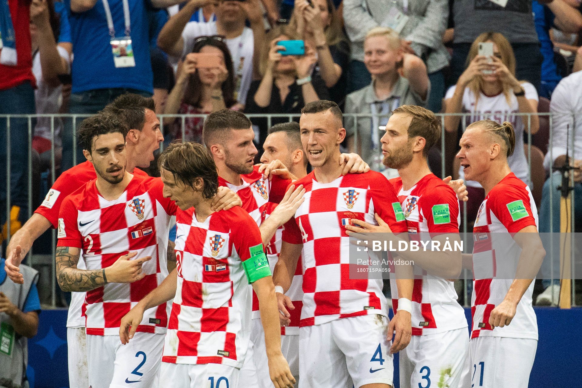 Ivan Perisic (middle) celebrates with team mates
