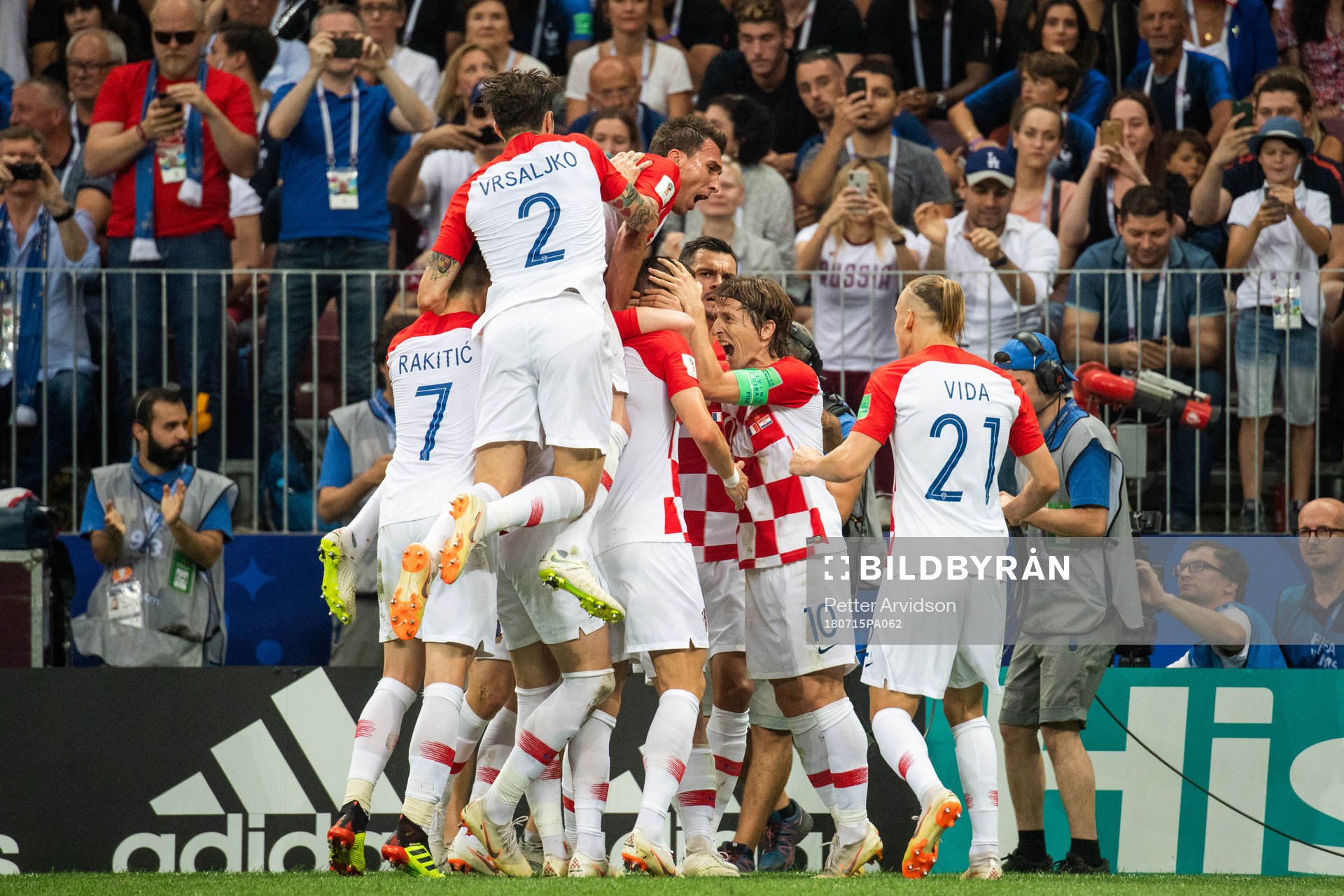 Luka Modric and Ivan Perisic celebrates with team mates
