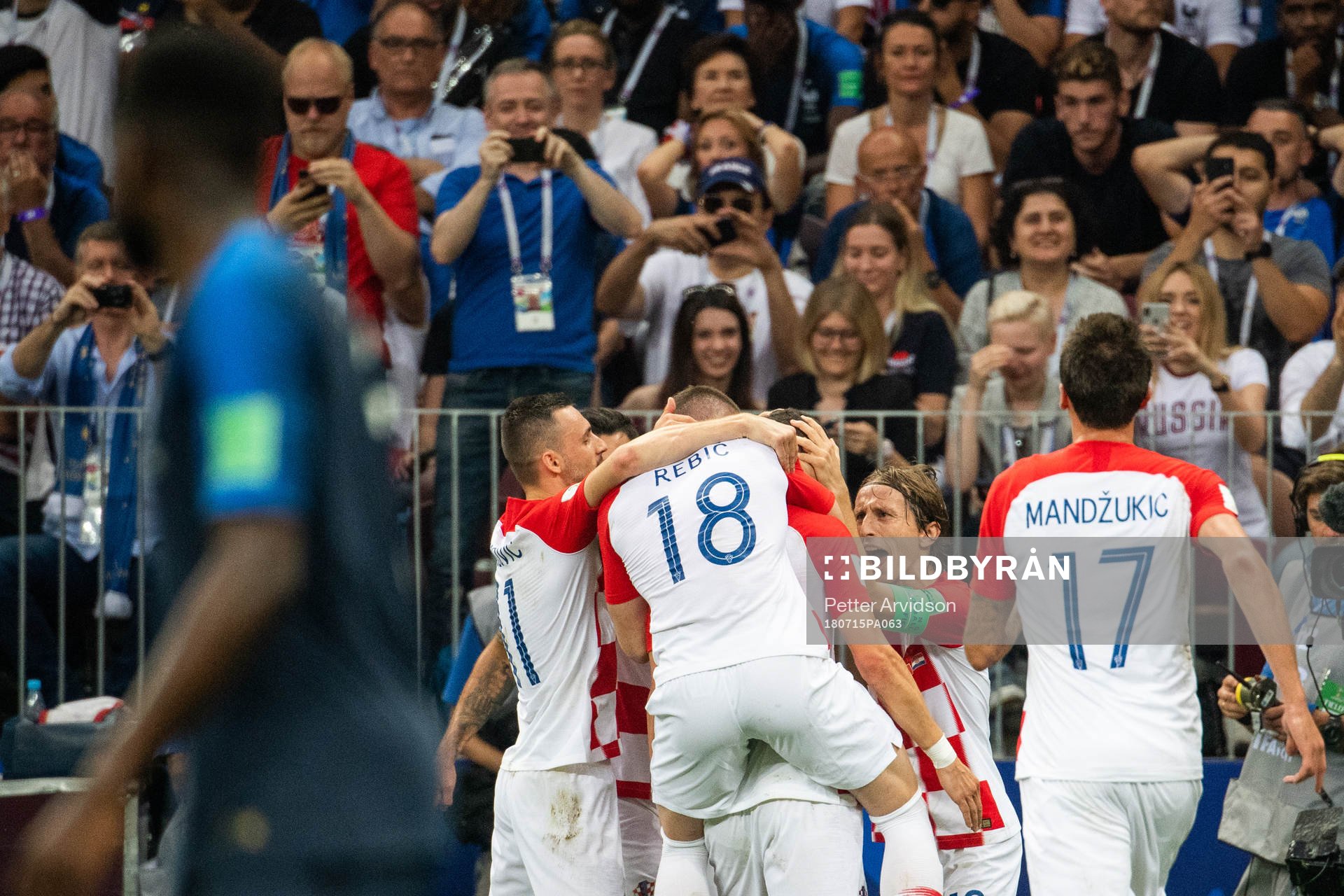 Luka Modric and Ivan Perisic celebrates with team mates