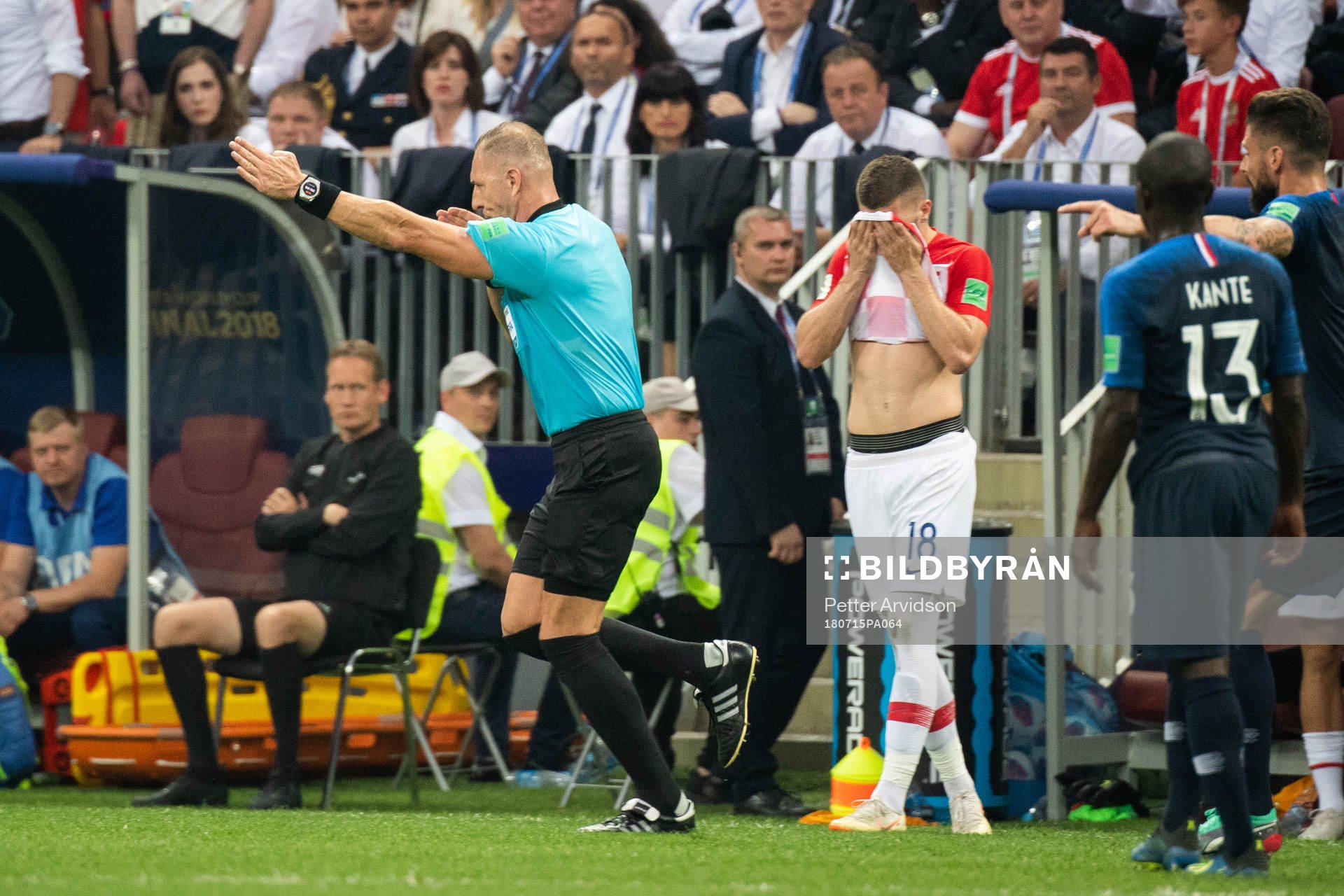 Referee Nestor Pitana calls a penalty