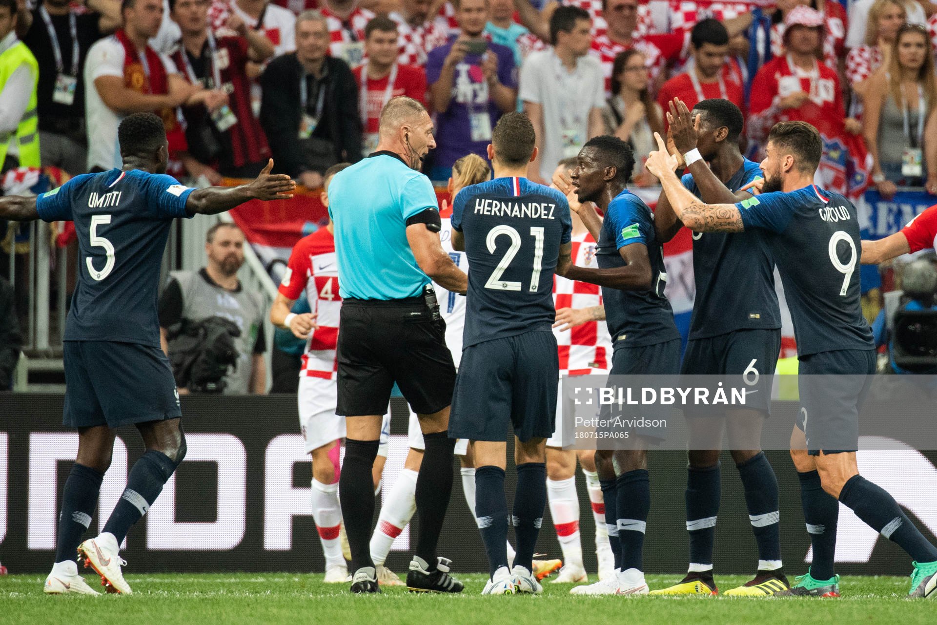 Players of France reacts and calls for a penalty against