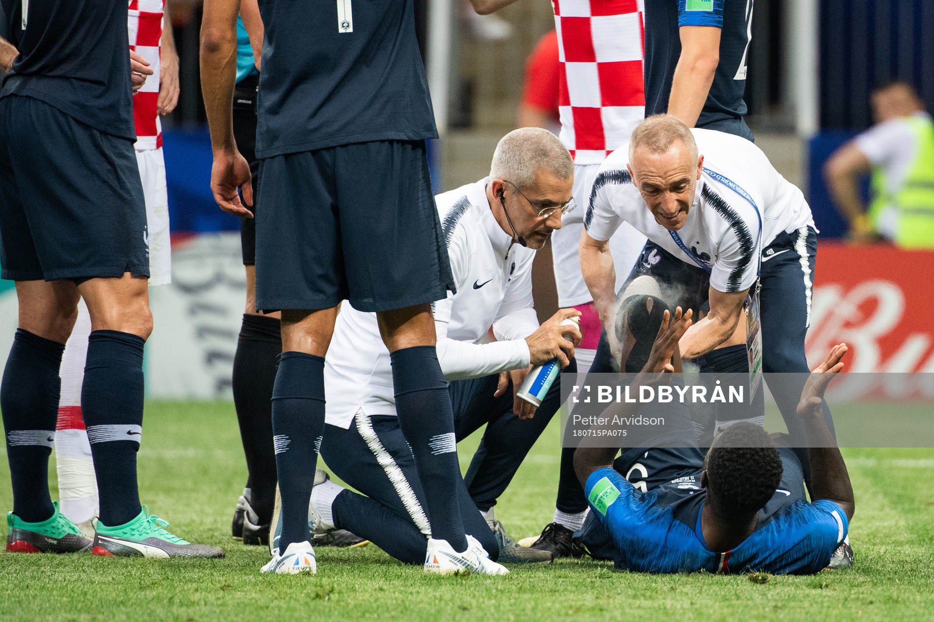 Samuel Umtiti of France gets medical attention