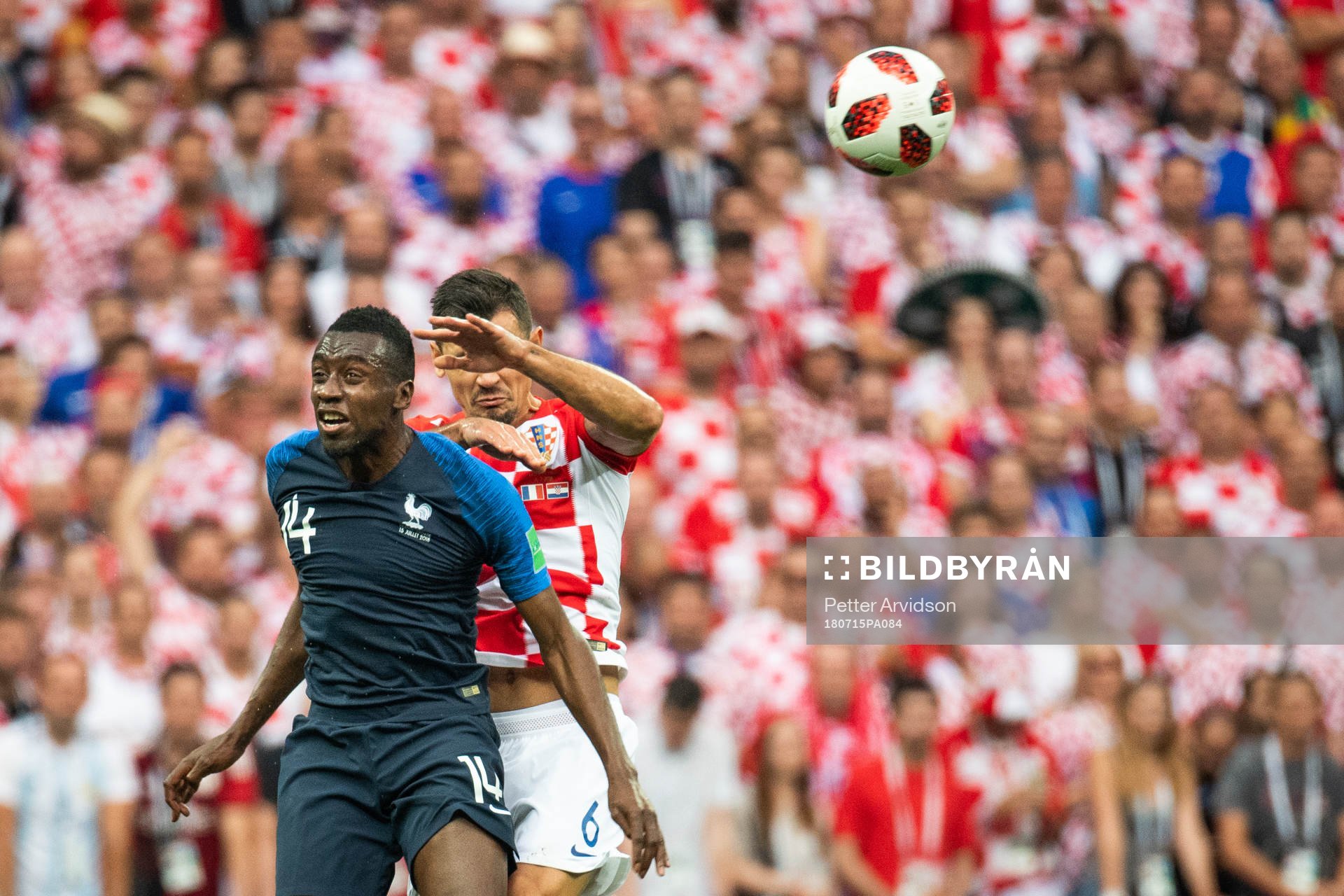 Blaise Matuidi of France competes for the ball with Dejan