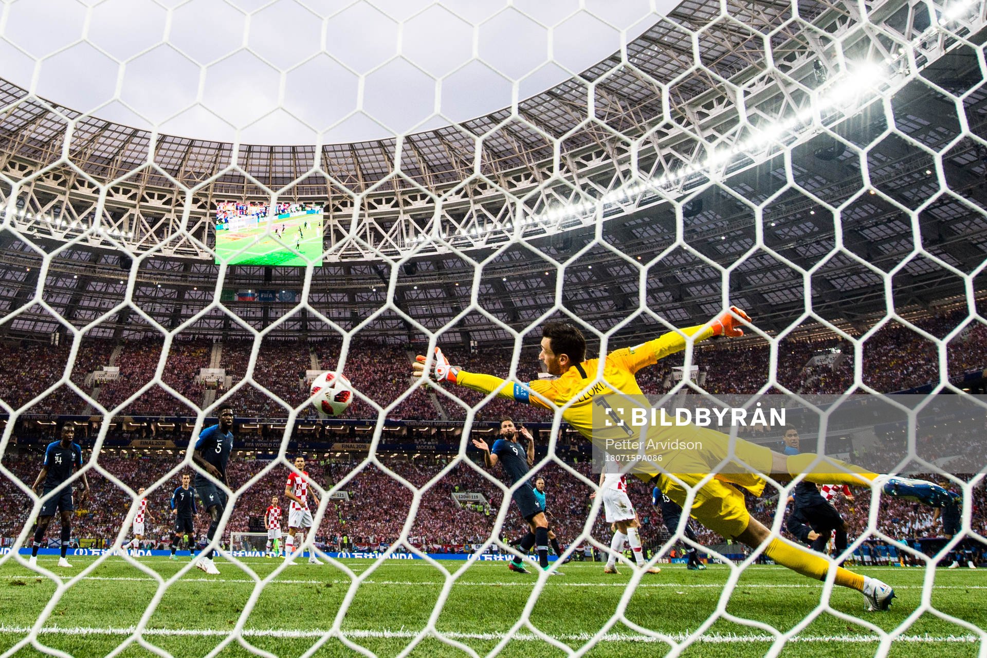 Ivan Perisic of Croatia scores the 1-1 goal behind