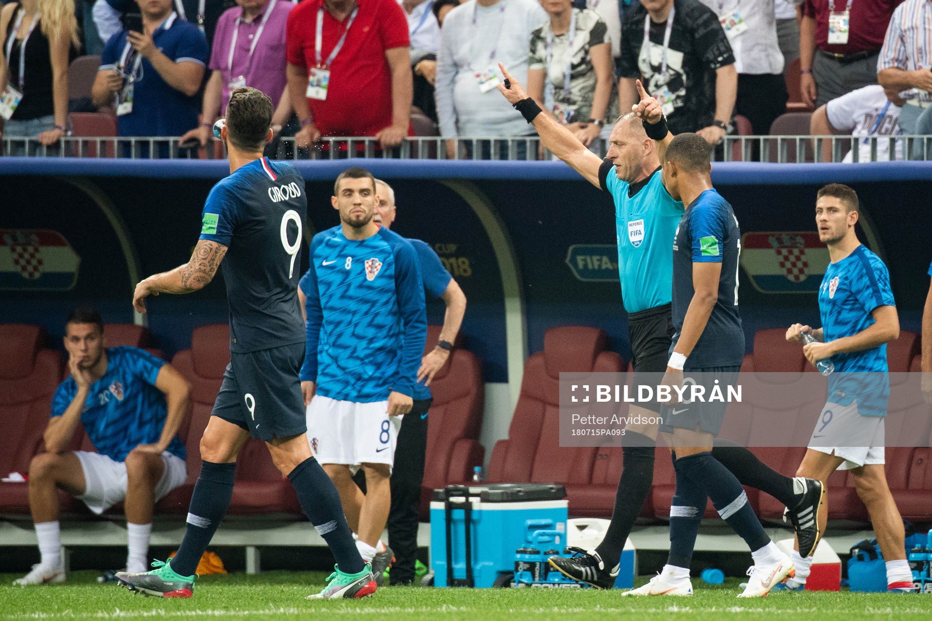 Referee Nestor Pitana signals for video review regarding a