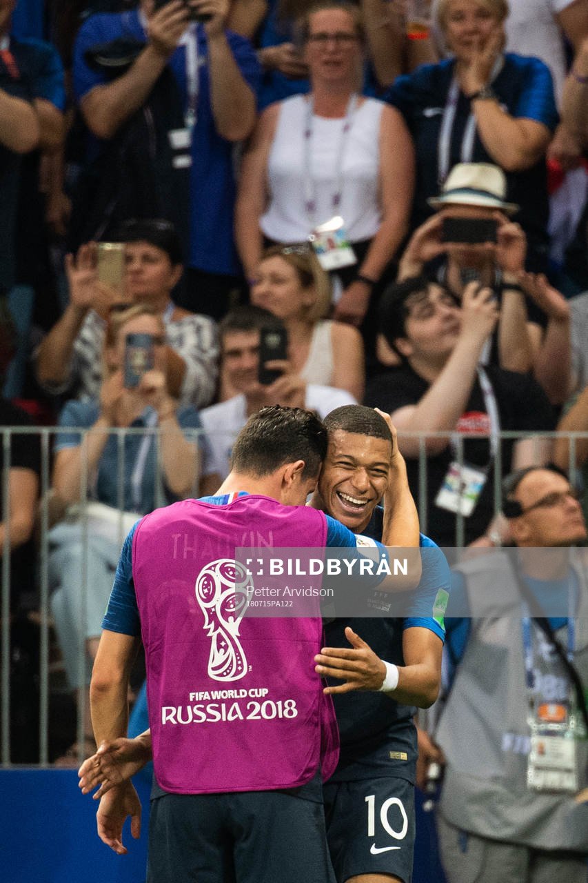 Kylian Mbappe of France celebrates with team mates