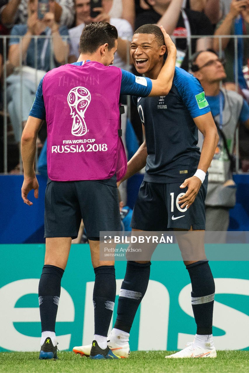 Kylian Mbappe of France celebrates with team mates