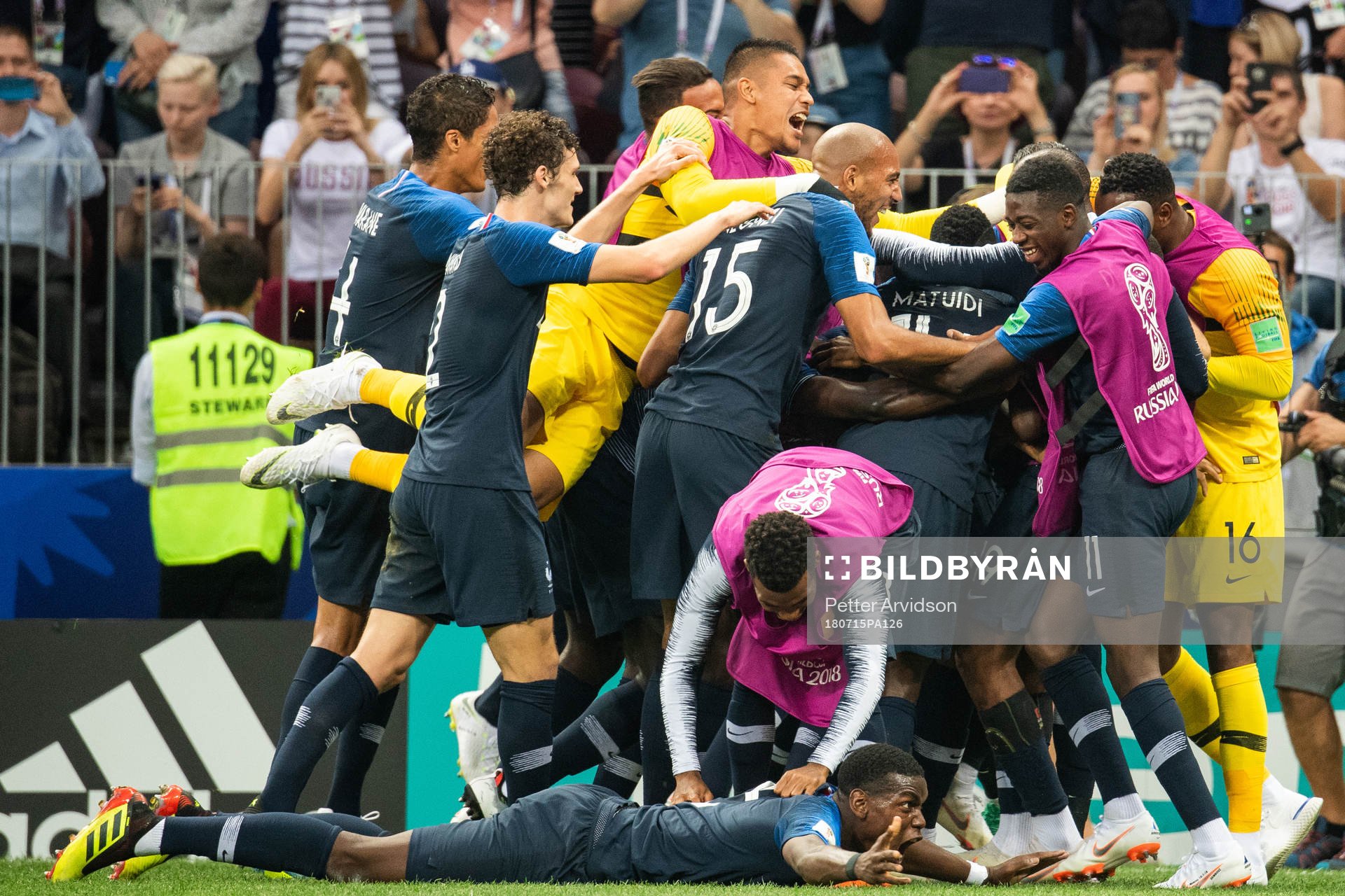 Kylian Mbappe of France celebrates with team mates after scoring 4-1 during the FIFA World Cup final match between France and Croatia on July 15, 2018 in Moscow.