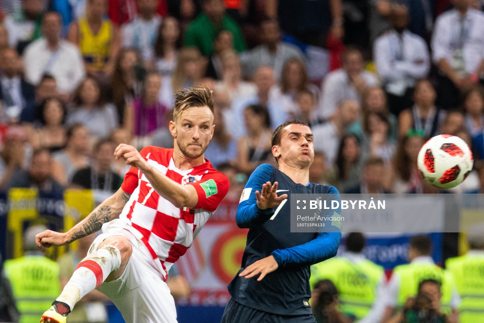 Ivan Rakitic of Croatia and Antoine Griezmann of France