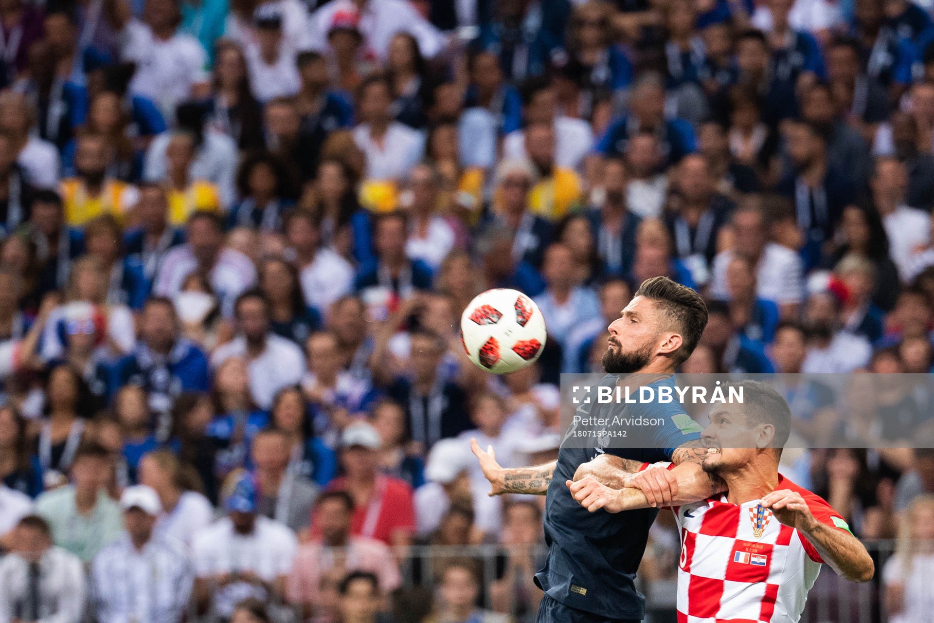 Olivier Giroud of France and Dejan Lovren of Croatia